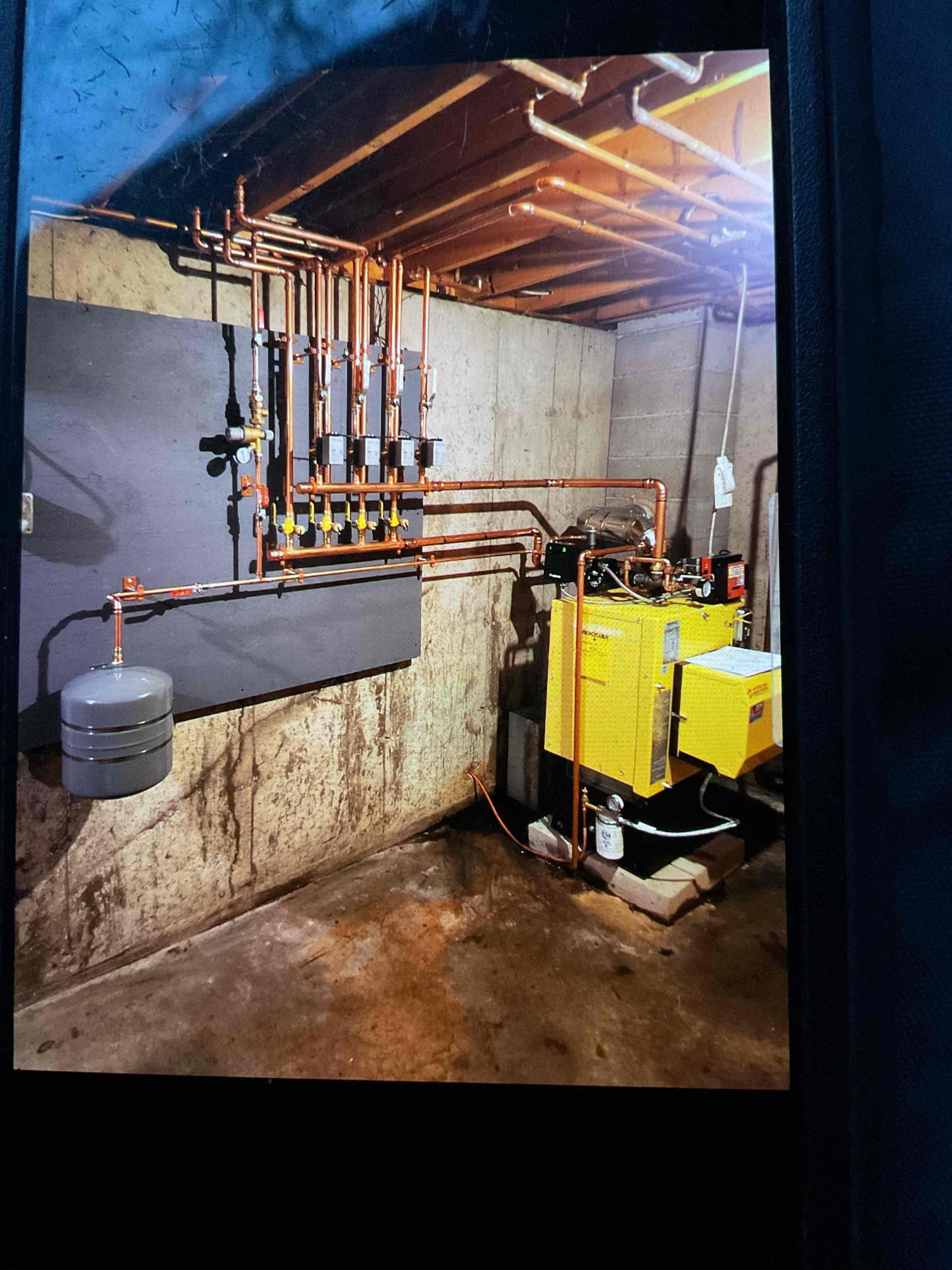 We installed a new System 2000 oil boiler, installed new manifolds, and flue pipe. Reconnected the existing indirect water heater to improve reliability, efficiency, and safe operation. Purged all zones clear of air to ensure proper heat flow. Checked boiler safeties. Tested system for proper operation. Had a problem with zone 2 and floor thermostat not holding a call so replaced it with new. Will need to return to give customer a total walkthrough.