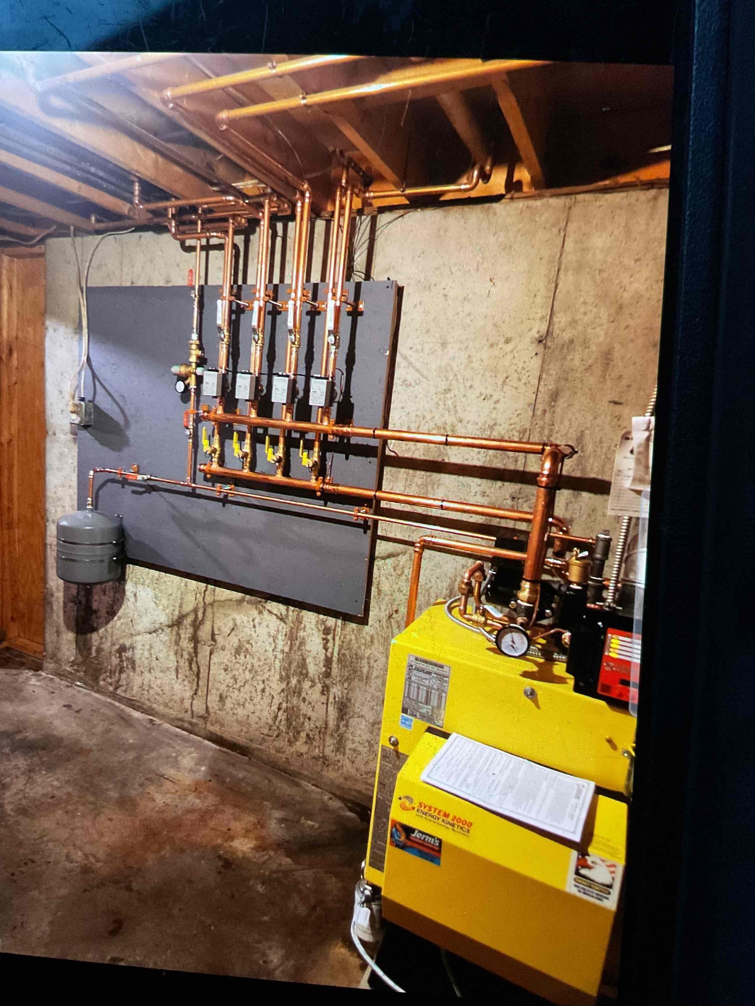 We installed a new System 2000 oil boiler, installed new manifolds, and flue pipe. Reconnected the existing indirect water heater to improve reliability, efficiency, and safe operation. Purged all zones clear of air to ensure proper heat flow. Checked boiler safeties. Tested system for proper operation. Had a problem with zone 2 and floor thermostat not holding a call so replaced it with new. Will need to return to give customer a total walkthrough.