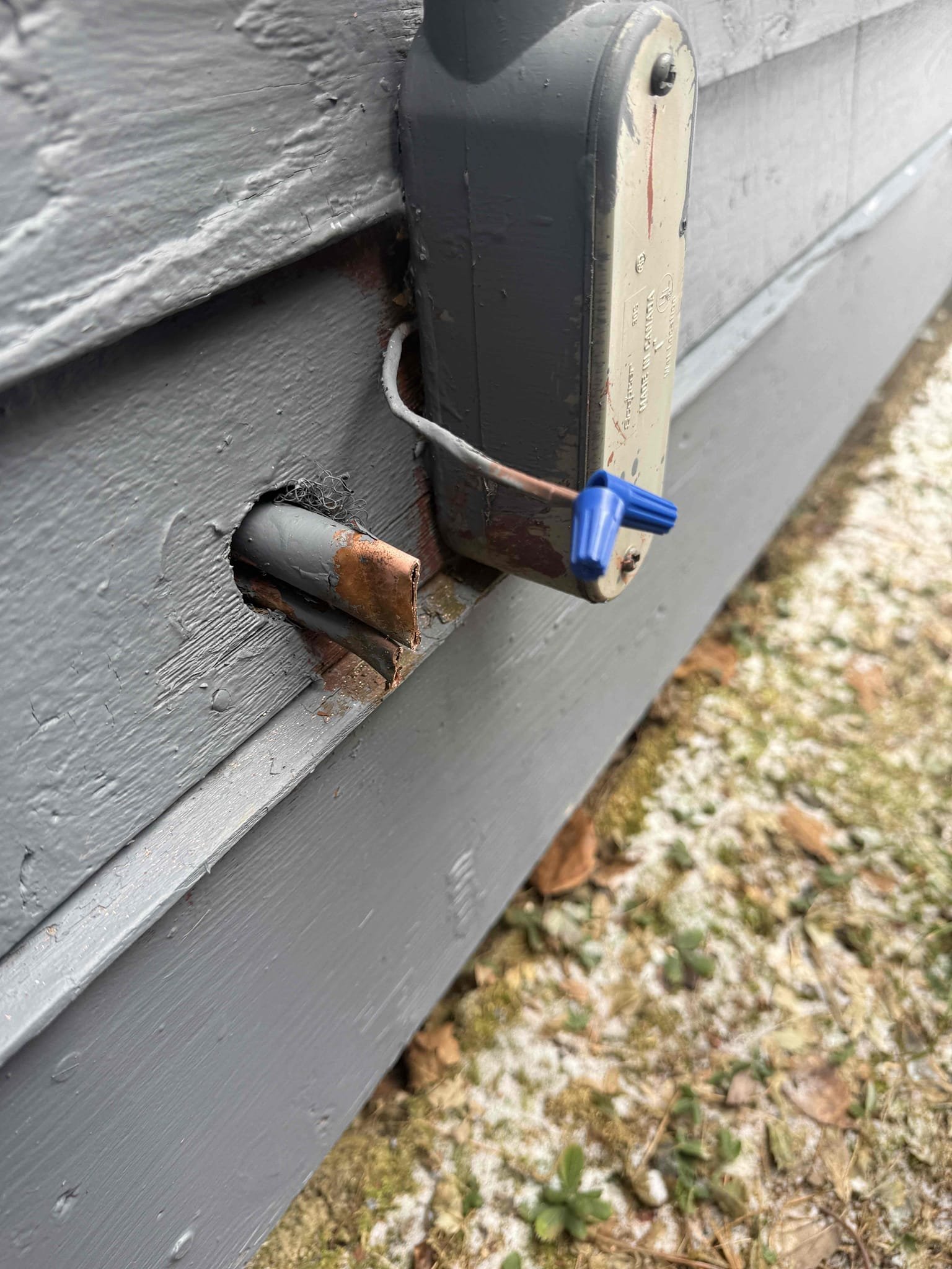 Disconnected the existing air conditioning unit from the residence to allow for homeowner removal. Verified the condenser contained 0 PSI and no refrigerant. Cut and crimped the copper line sets to properly seal the system, disconnected the electrical whip, and left the electrical disconnect in place on the house. De-energized the circuit by shutting off the breaker supplying the outdoor disconnect, and disconnected and secured the thermostat control wires with wire nuts.