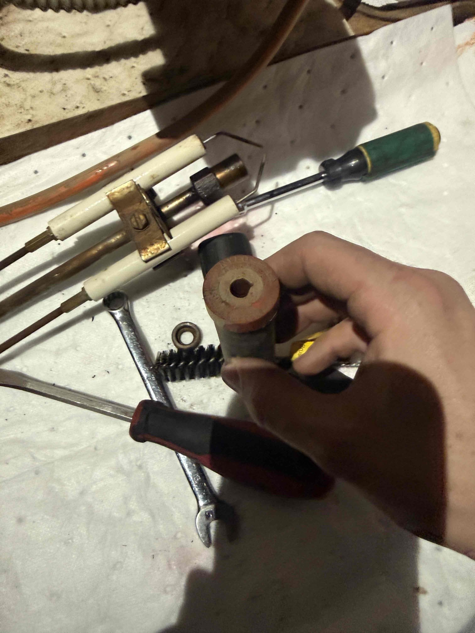 Performed annual maintenance on the oil-fired furnace, including a comprehensive inspection of all safety controls and system components to ensure safe and efficient operation in accordance with manufacturer specifications. Replaced the oil nozzle, oil filter, and strainer. Cleaned the furnace and smoke pipe by brushing and vacuuming. Conducted a combustion analysis and draft test, and inspected the heat exchanger. All tests passed at the time of service. Due to the age of the furnace and its overall condition, replacement of the unit is highly recommended.