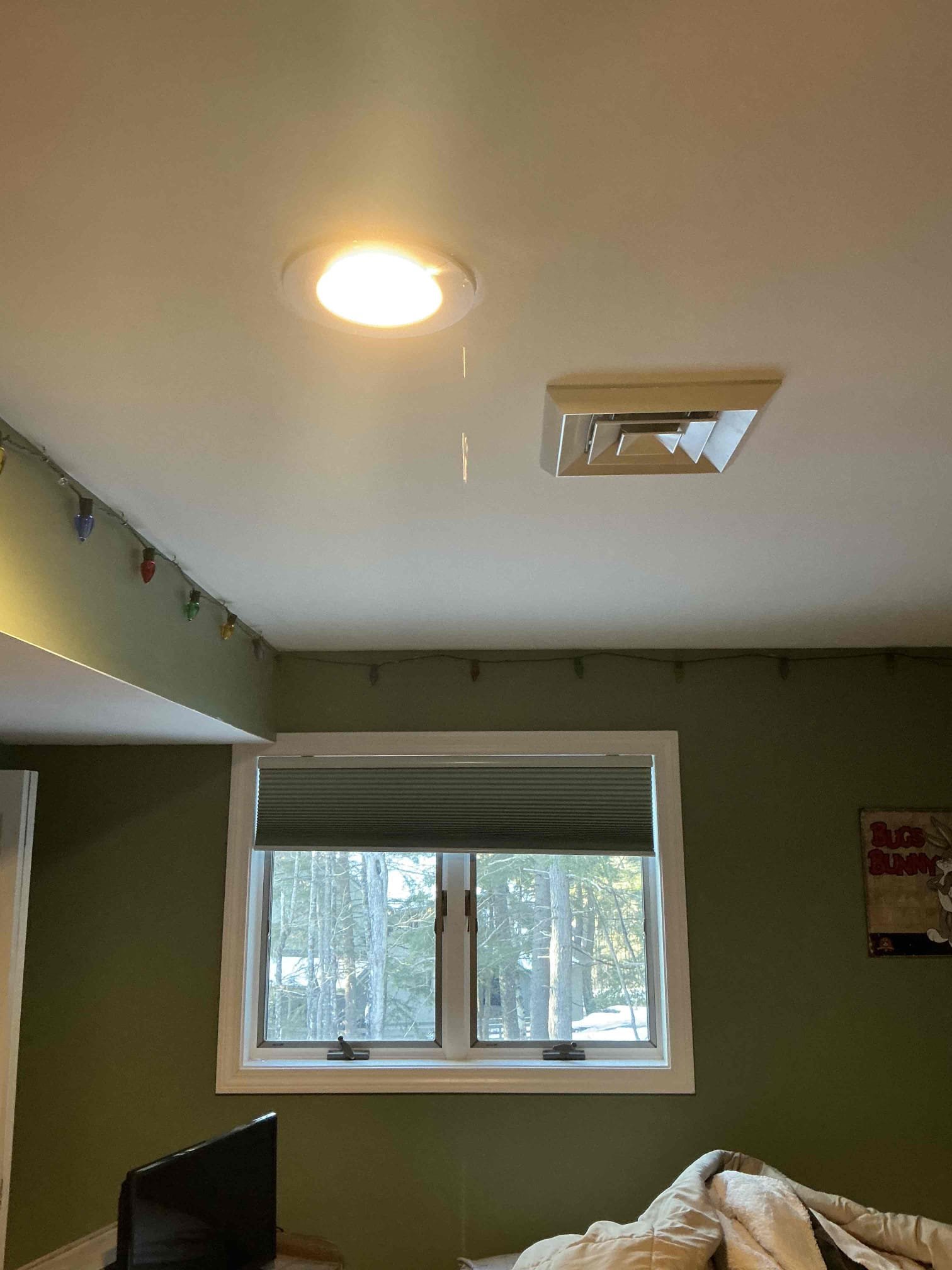 Customer stated that water was leaking from basement bedroom ceiling and light fixture. I arrived and found that water to the house was turned off after customer noticed water leak. We turned water back on to the house and I did not see any water leaking from pipes in the area. Customer stated that she noticed the leak after shower had been taken in bathroom above where the leak was coming from. We turned shower on and immediately noticed the water starting to leak. I advised customer to not use that bathroom and we will have a plumbing technician out on Monday to examine the shower drain.