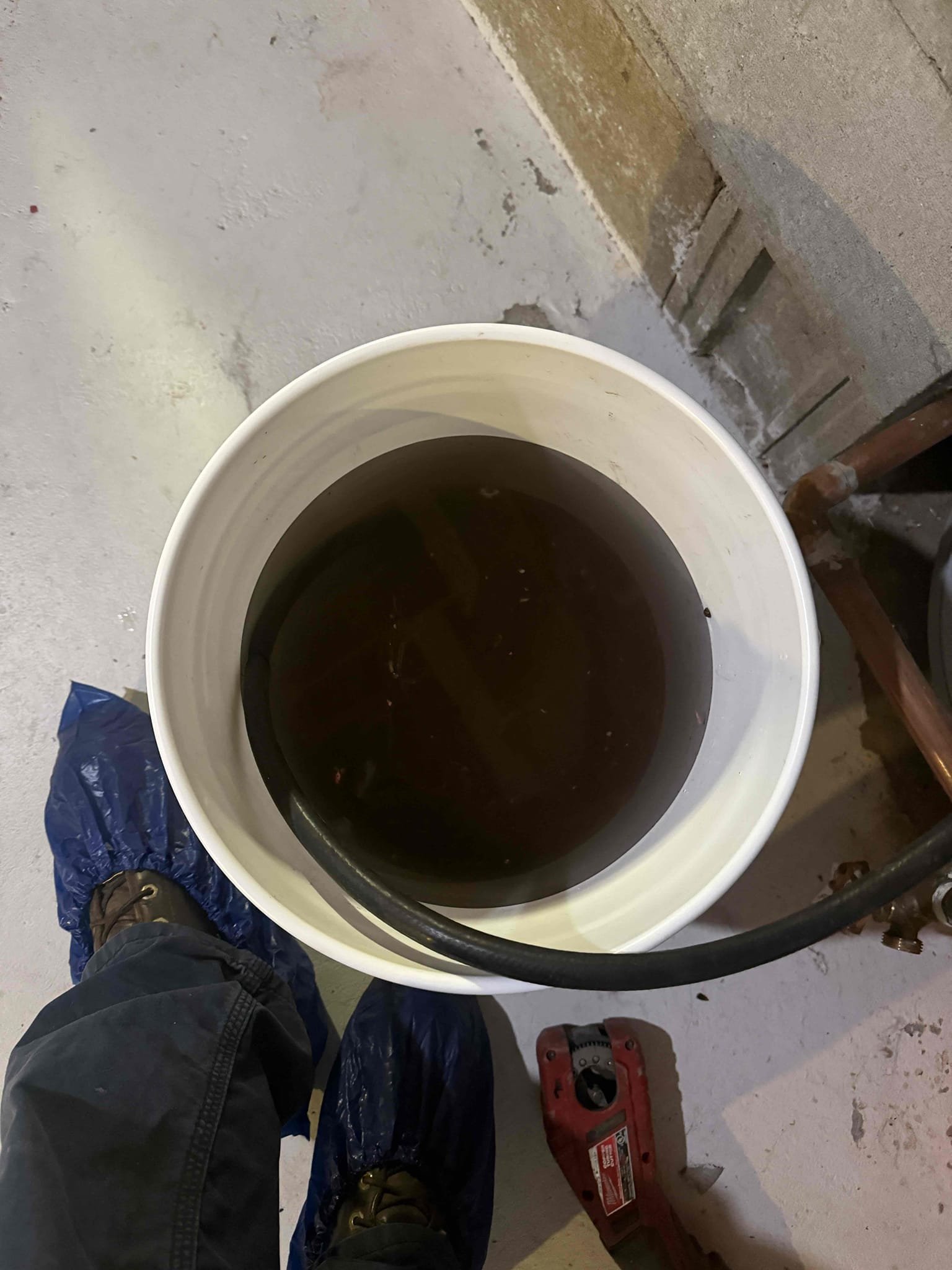 Living room radiator removed and a temporary bypass line installed to maintain heat to the first floor. Shutoff valves were added for future reinstallation. An estimate to reinstall the radiator will be provided once wall repairs are completed. We purged zone and drained out inhibitor that was previously put into system.