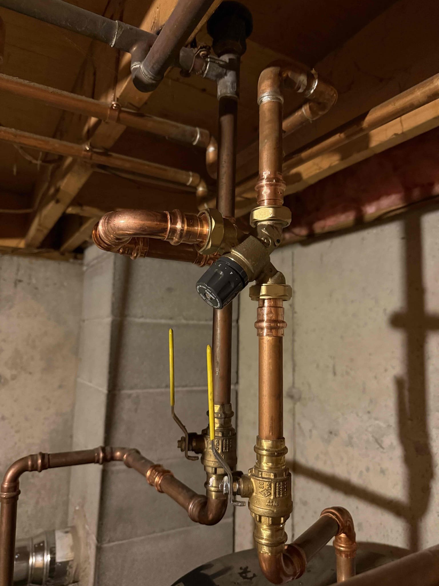 Installed a mixing valve on the water heater. Set the water heater temperature to 140°F and adjusted the mixing valve to 4.5. Checked the mixing valve for leaks and verified proper hot water temperature. Reviewed system operation with the customer.