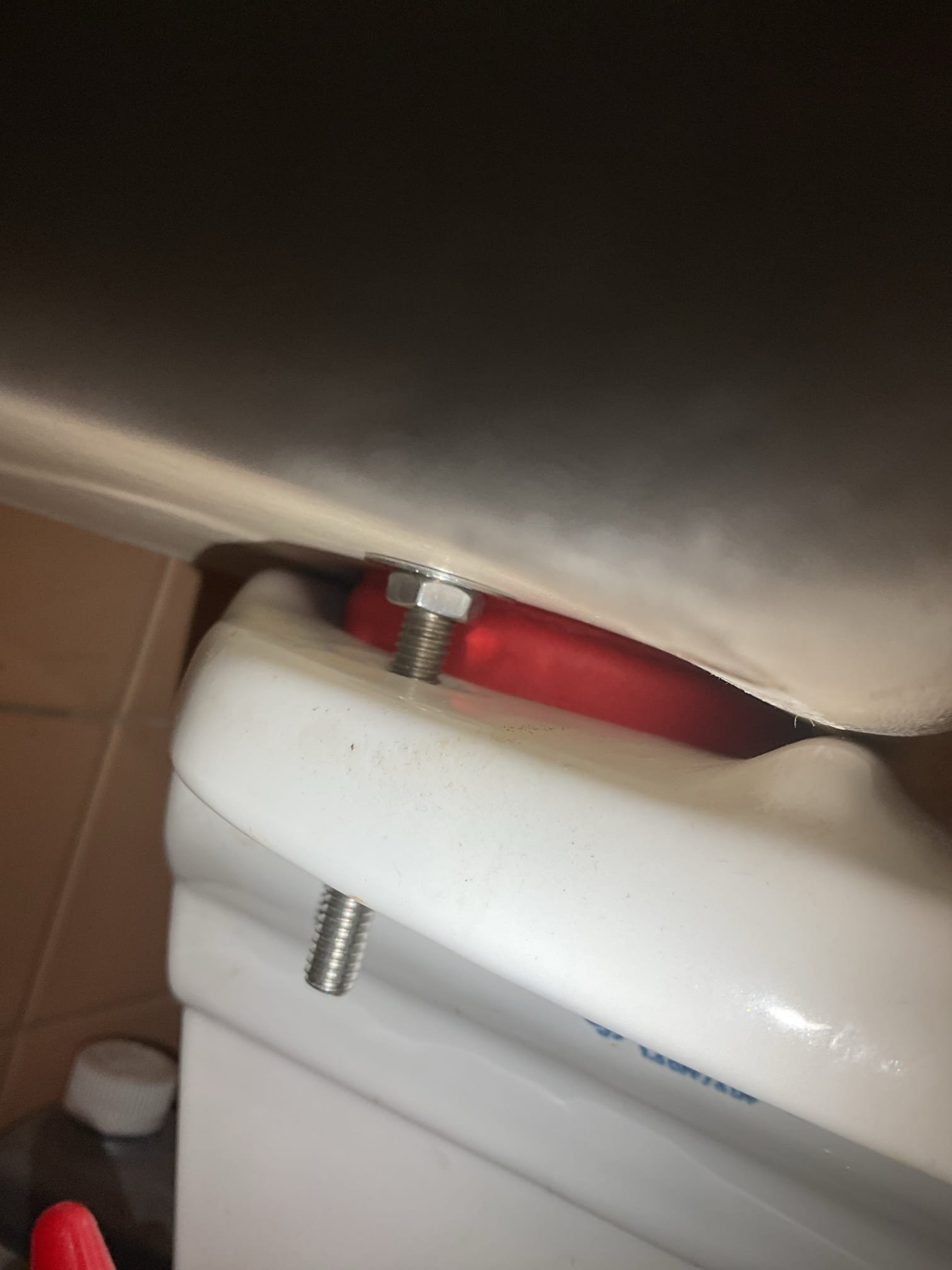 The toilet tank mechanism was fully replaced, including the fill valve, flush tower, tank-to-bowl bolts, and all required gaskets. The tank was properly reassembled and securely mounted to the bowl, ensuring correct alignment and a watertight seal. After installation, the system was thoroughly tested for proper filling, flushing, and shutoff operation. All components are functioning as intended, and no leaks were observed at the tank, bolts, or supply connection.