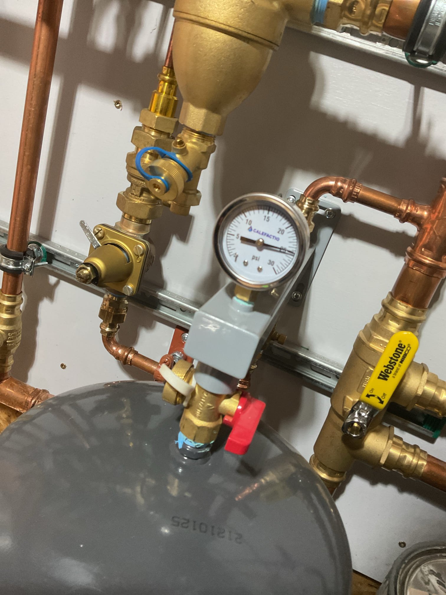 Arrived on site to diagnose relief valve popping on new install. We saw that the boiler was flat when we arrived. We refilled the boiler and test ran it. The boiler quickly climbed to 25+ psi. We then found that the valve to the expansion tank was closed so the extra pressure had no where to go. It may have been bumped closed but we opened it up and the boiler pressure went back to normal. Watched unit run for 10minutes with no more pressure issues occurring.

System is operating properly