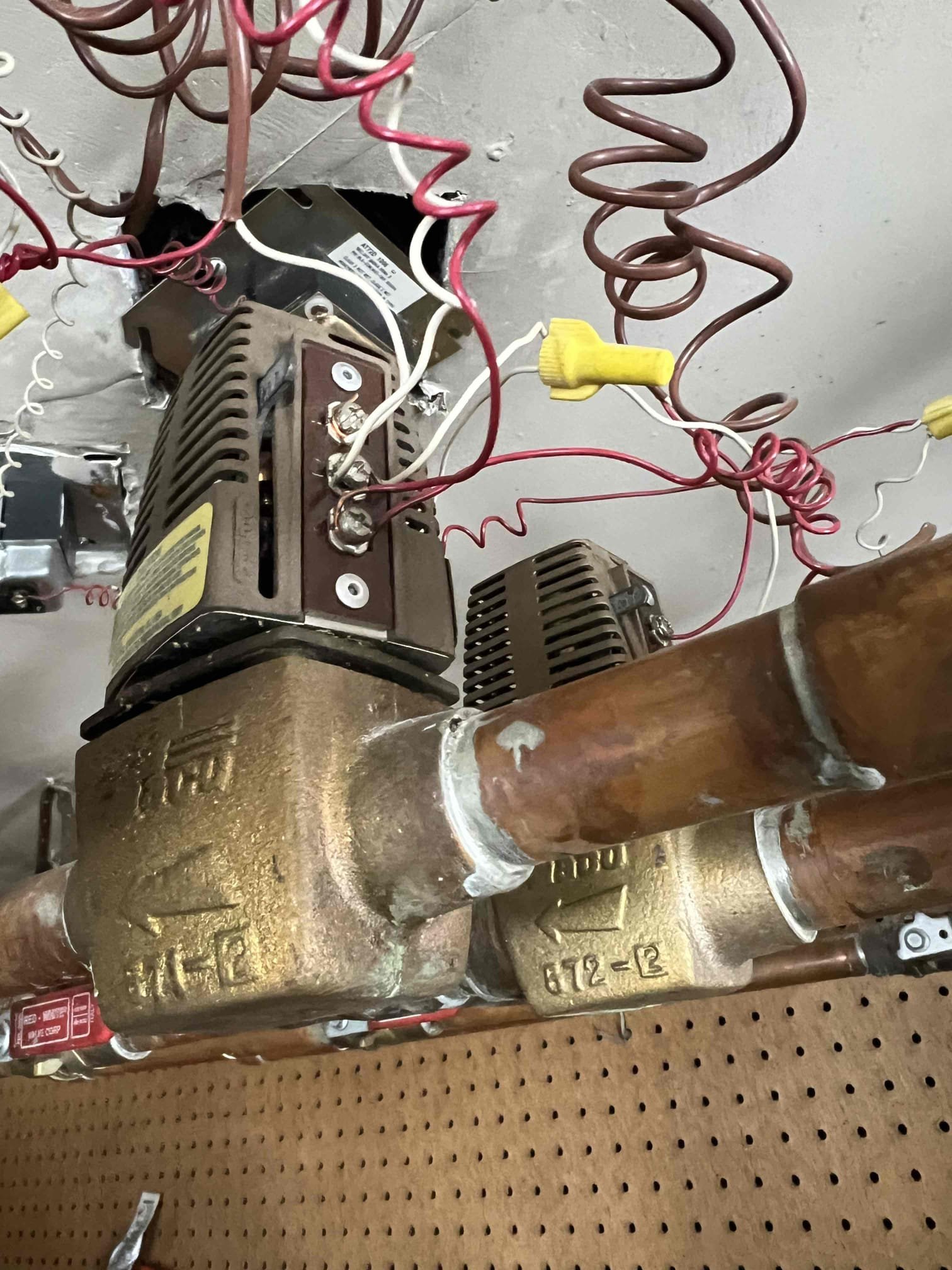 Arrived onsite to investigate no heat in the basement and master bedroom. The home has an oil boiler with an indirect water heater, and the heating zones are controlled by zone valves. Upon arrival, the zone valves for the affected areas were found to be closed. I quickly diagnosed that the zone valves had power but were not opening. With the customer’s approval, I replaced both zone valves and verified proper operation. The system is now working properly at this time.