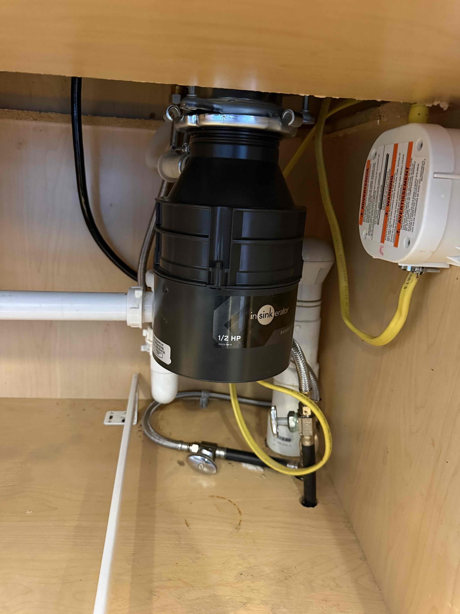 For this job, we removed and disposed of the existing non-functioning garbage disposal and replaced it with a new 1/2 HP garbage disposal unit. The electrical and drain connections were disconnected and then properly reconnected to the new disposal. All mounting hardware and seals were securely installed. The unit was tested to confirm proper operation, correct drainage, and to verify that no leaks were present.