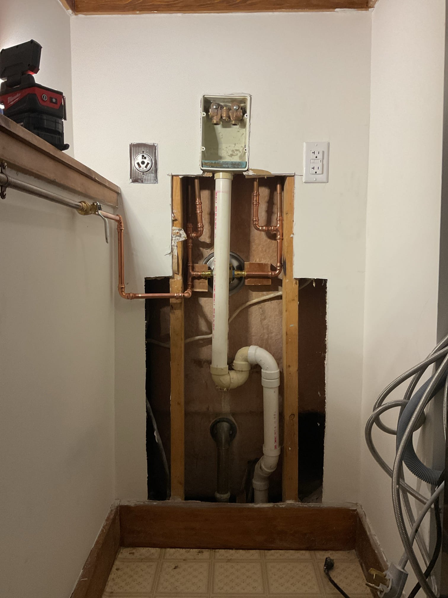 We returned to address leaking pipes behind the shower and to install a new shower valve. The existing valve and all leaking pipes and fittings were removed and replaced with a new shower valve, new shower trim, and new fittings and piping supplying the automatic clothes washer and the outdoor wall hydrant, which had also been leaking. After restoring water service, all connections were thoroughly tested with no leaks found. We additionally adjusted the water heater mixing valve to deliver approximately 120°F hot water to the home, correcting a condition where hot water was previously only lukewarm.