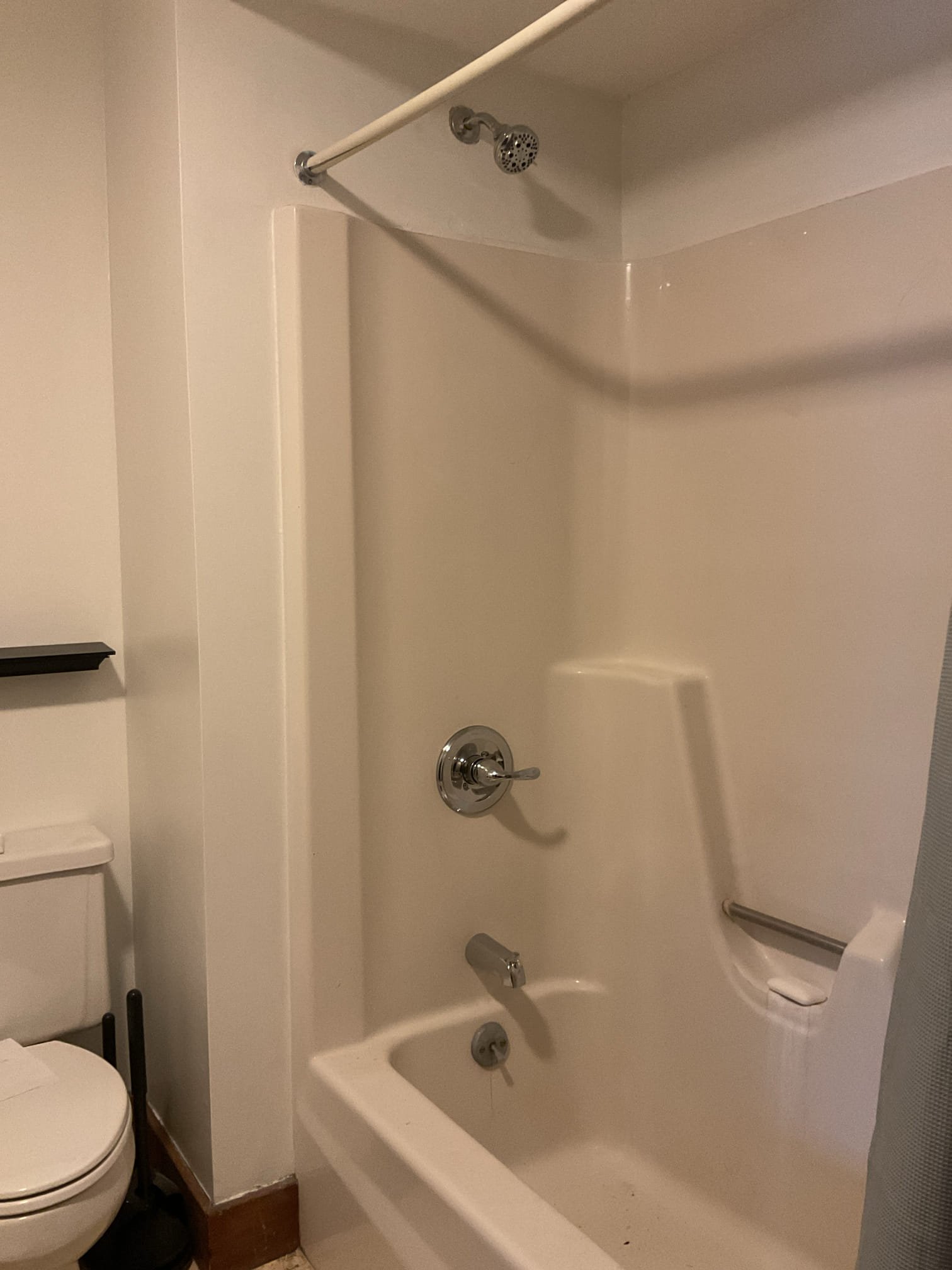 We returned to address leaking pipes behind the shower and to install a new shower valve. The existing valve and all leaking pipes and fittings were removed and replaced with a new shower valve, new shower trim, and new fittings and piping supplying the automatic clothes washer and the outdoor wall hydrant, which had also been leaking. After restoring water service, all connections were thoroughly tested with no leaks found. We additionally adjusted the water heater mixing valve to deliver approximately 120°F hot water to the home, correcting a condition where hot water was previously only lukewarm.