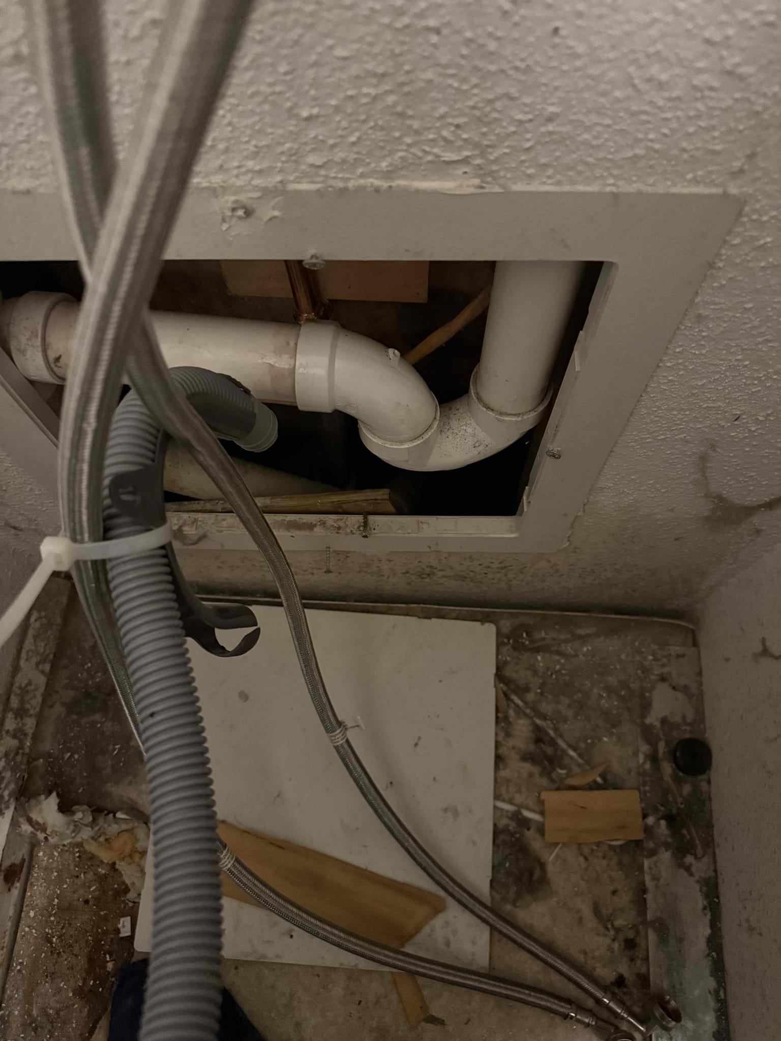 For this job, we replaced the customer-supplied tub waste and overflow trim along with the shower valve to restore proper function and appearance. To access the back of the shower, the washer and dryer were moved as needed. The existing tub waste trim and shower valve were removed and replaced with the customer-provided components, and all necessary plumbing connections were made. After installation, the system was tested, and our work was confirmed to be operating properly and leak free. During testing, a separate leak was identified in the drain pipe located beneath the tub where it enters the ground. Due to the location of the leak, a return visit will be required to fully diagnose the issue, determine the exact location, and outline the recommended steps moving forward.