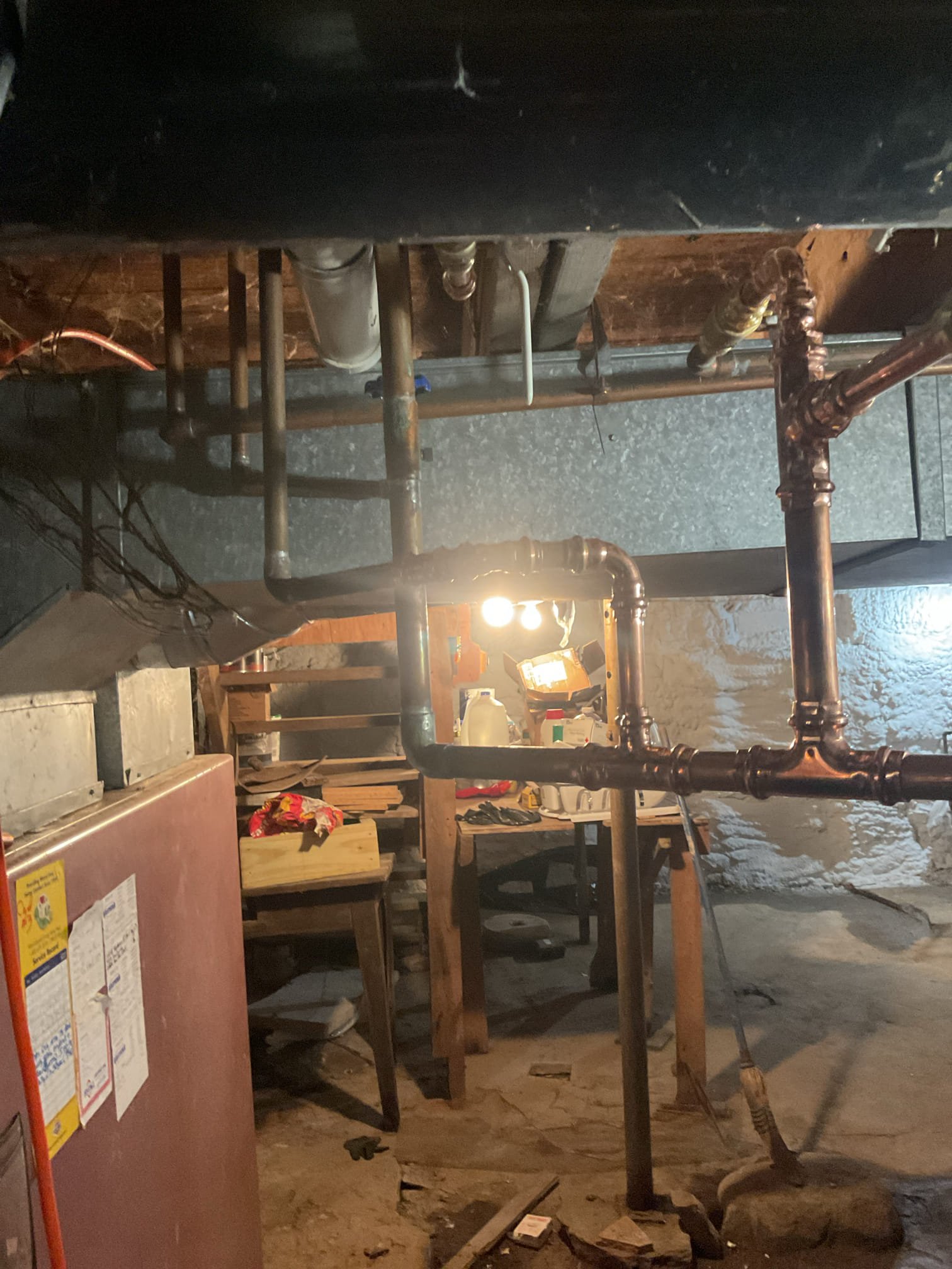 Upon arrival, the homeowner reported water discharging from beneath the dishwasher. Upon inspection, it was determined that the dishwasher supply line had frozen and split, causing the leak. A new dishwasher supply line was installed, along with a 90-degree fitting at the dishwasher connection, to restore proper water flow.

While on site, we also inspected the basement and found a section of domestic water piping that was heavily corroded, including four gate valves that required replacement. The deteriorated piping was removed and replaced with new piping and fittings. We installed one new 3/4” ball valve and three new 1/2” ball valves to allow proper isolation of fixtures in the event of an emergency.

All completed work was thoroughly tested to ensure proper operation. At the time of testing, there were no leaks observed from any of the newly installed components.

After completing the dishwasher supply line installation, we attempted to start the dishwasher; however, the unit woul