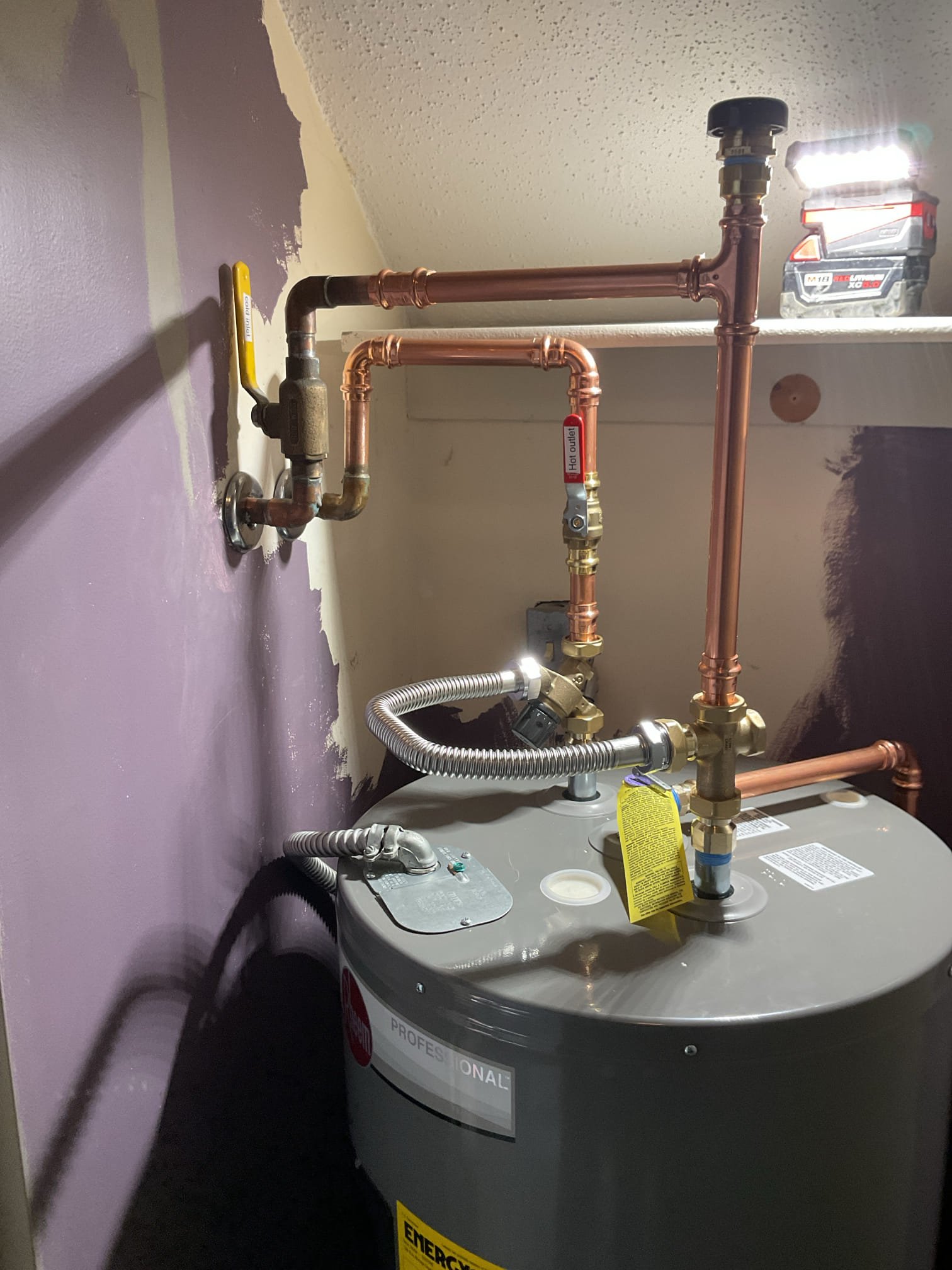 Upon arrival customer had an old water heater which was functional poorly. Techs shut power off to the water heater, ran out the hot water, and shut off cold water inlet to the water heater and drained it down afterwards. 

Techs then removed it and disposed of the water heater and installed new electric 40 gallon Rheem water heater with a mixing valve as required by code. I then ran the air out of the water heater as to not dry fire it and damage the elements. I also added a shutoff valve on the out water outlet for improved serviceability. 

Everything is functioning properly with no issues at the time of service. 