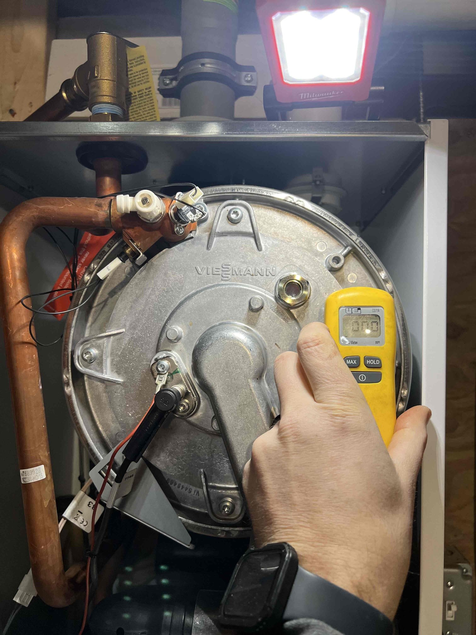 Arrived onsite to investigate intermittent heat issues on a Viessmann boiler that has faulted 4–5 times over the past month with an F4 (no flame signal) error code. We were onsite last month and replaced the igniter. I inspected the igniter wiring and found it to be within specifications. I checked the gas pressure and found it at the low end of the acceptable range at 10 in/wc, (specification is 10–14 in/wc.) I adjusted the gas pressure at the 2nd stage regulator to 13 in/wc.

Performed an annual tune-up, including cleaning the burner, heat exchanger, igniter, neutralizer and condensate trap. Inspected the expansion tank, relief valve, combustion, venting, and overall hydronic system operation. Bubble-tested the gas line and checked carbon monoxide levels; no leaks were found. Verified proper operation, and the system is working correctly at this time.