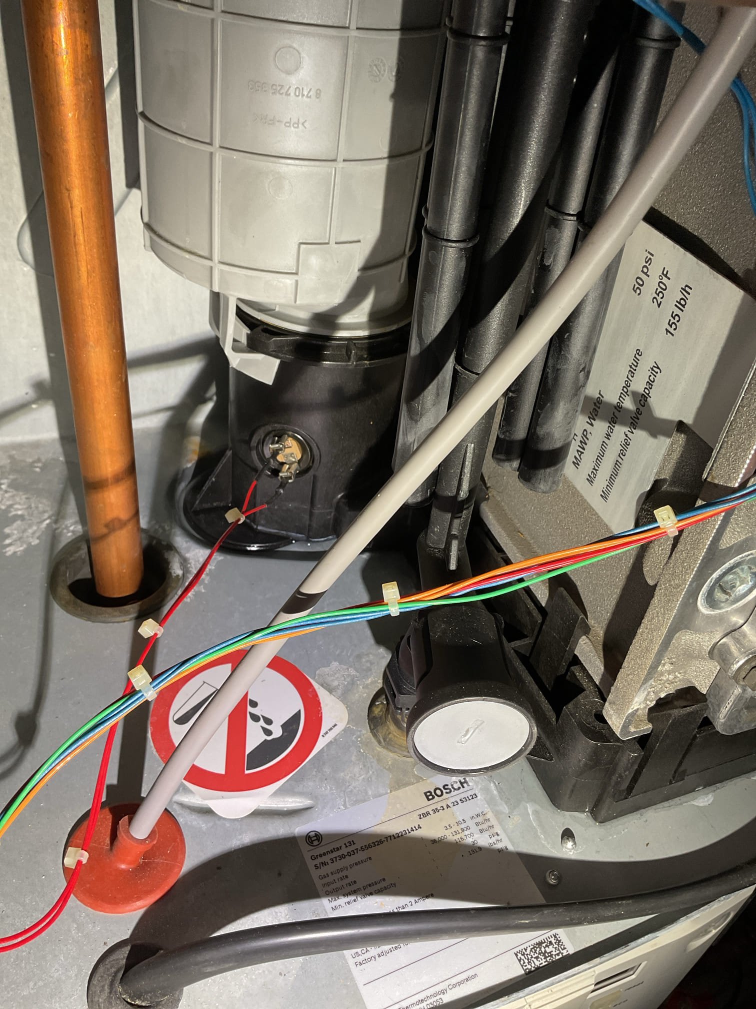 Arrived on site to inspect boiler vibrating. After our initial inspection we found that the flue pipe was disconnected and was causing the boiler to suck in exhaust fumes through the intake. We noted that the inside of the boiler had condensation and other signs of flue gases being present. We connected the flue pipe back up and performed a combustion analysis to verify system was operating properly. No CO leaks present and flue gas is now venting properly. 

Thank you for your business!