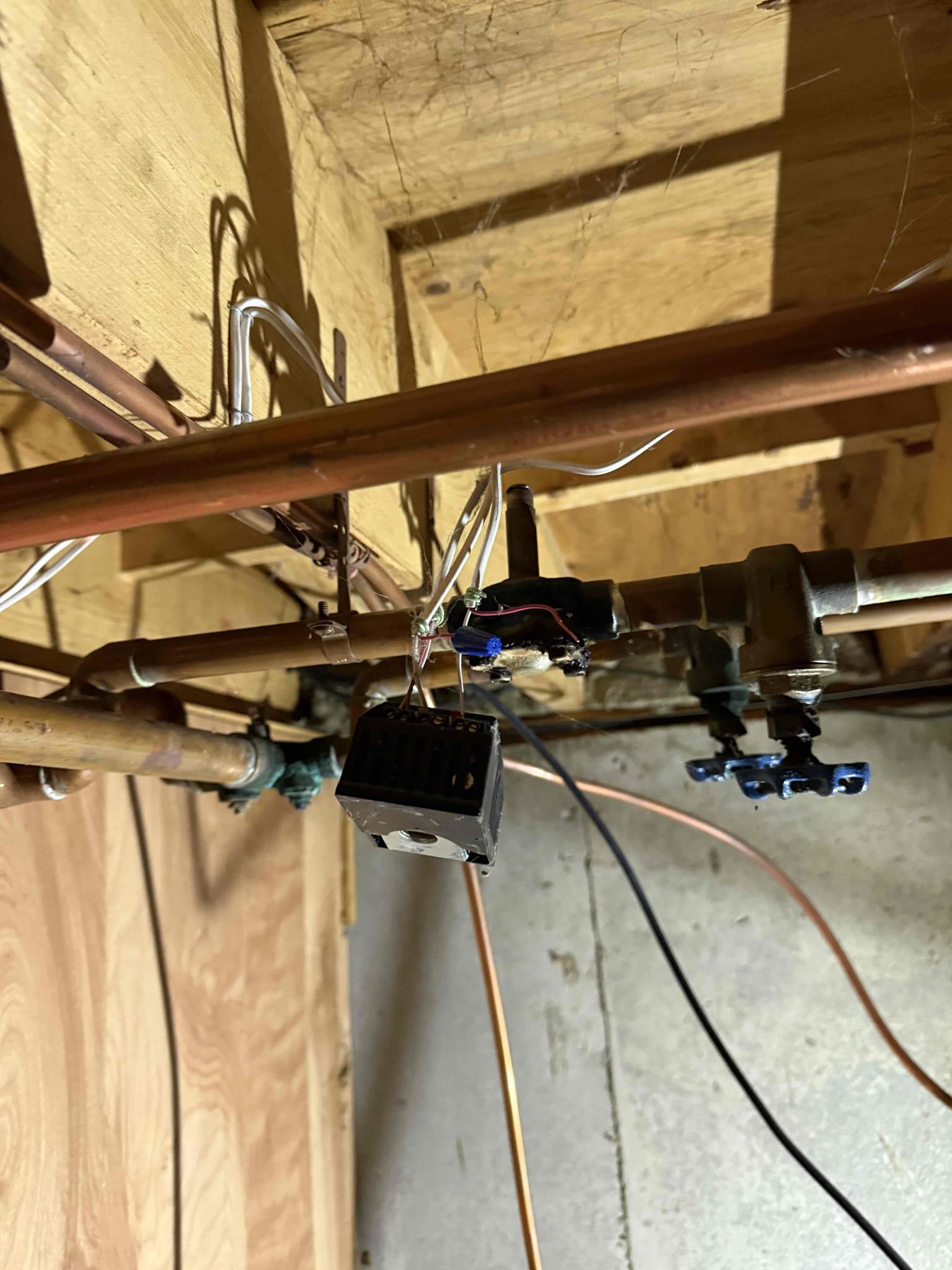 The customer reported a loss of heat in the home. She stated that she attempted to reset the boiler once; however, the boiler did not attempt to fire.

Upon arrival, I found the burner motor had tripped and failed. The burner motor and nozzle were replaced, and the boiler was restarted. I allowed the boiler to run up to the high limit and observed system pressure rising to approximately 40 PSI. At that time, the pressure relief valve did not discharge.

The expansion tank and pressure relief valve were replaced. After restarting the boiler, system pressure stabilized at approximately 20 PSI. During operation, the relay control board was observed chattering.

Further inspection revealed a failed automatic zone valve (AutoMag) serving the second-floor heating zone. Power to the automatic zone valve was disconnected, which resolved the control board chattering issue.

Due to the age of the system and the overall condition of the boiler and its components, boiler replacement is strongly re