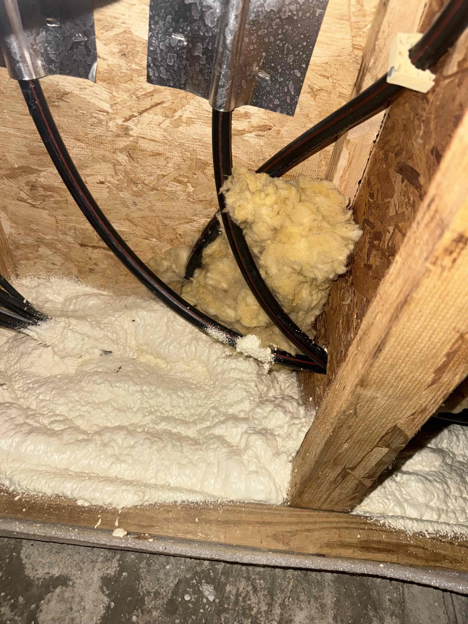 The existing exterior hose bib was found to be frozen, with visible ice present on the spout, indicating a failure of the fixture and a risk of internal damage. The water supply was properly shut off, the damaged hose bib was removed, and a new frost-free hose bib was installed to prevent future freezing in cold temperatures. The new fixture was securely installed, the water line was reconnected, and the system was tested to confirm proper operation and to ensure there were no leaks present. We left hose bib shut off for remainder of the winter.