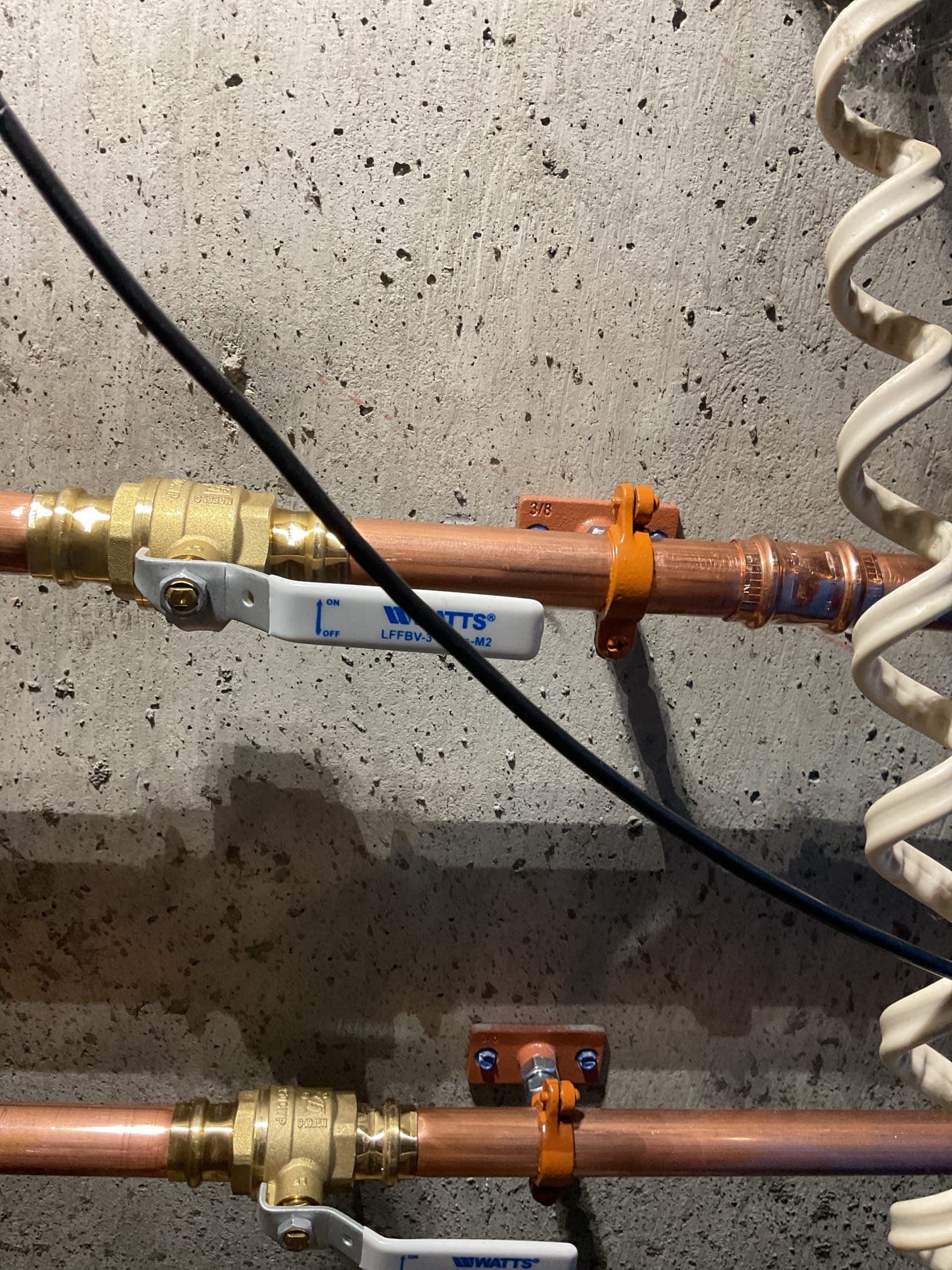 For this job we completed a return visit to attempt a number of repairs on the kitchen sink. Upon arrival the kitchen faucet was loose and spinning in place, the spout was experiencing a considerable amount of resistance during the swivel motion, and there was inadequate flow in both the hot and cold water supply. Multiple steps were taken to address all concerns.  
Step 
1) Remove the garbage disposal from the mounting flange. Tighten the faucet to the counter top
2) Remove the spout from the faucet body, by removing the set screw in the rear of the spout and lifting the spout upwards. The existing lubricant was cleaned and removed before applying new silicone lubricant to the rubber orings. The spout was reconnected.
3) The cartridge was removed and cleaned. The faucet body was purged of all water and potential debris. The screens within the water supply lines were cleaned and flushed
4) The shutoff valves were flushed
5) The faucet was re-assembled and tested. 
The faucet spout swiv