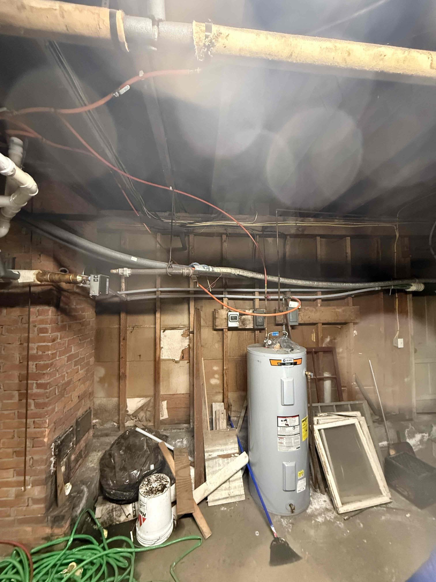 The existing piping located between the two houses where the leak was present was cut out and removed. The damaged section was replaced with new PEX piping of the same size and type, with couplings installed on both ends to ensure secure connections. The new piping was properly hung and supported to maintain correct alignment and prevent future stress. The system was purged of air and tested to verify proper heating operation. All connections were fastened and tested, confirming a leak-free installation and reliable performance.