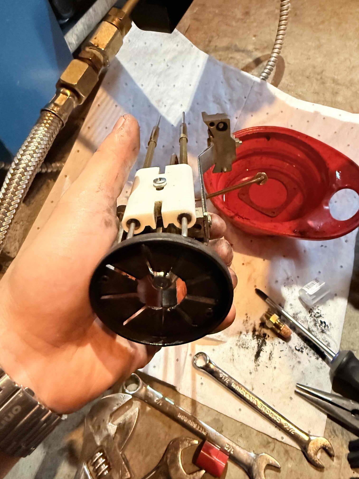 We performed an annual maintenance service on the Buderus oil-fired boiler. Service included replacing the oil nozzle, filter, and strainer; vacuuming and brushing the heat exchanger and smoke pipe; and cementing the smoke pipe connection at the chimney. A combustion analysis and draft test were completed, and all system safeties were inspected. At the completion of service, the boiler was operating properly.

During the maintenance, we observed that the boiler system pressure was elevated at 25 PSI, exceeding the recommended operating pressure of 15 PSI. Further inspection revealed a failed pressure relief valve and a failing expansion tank. With customer approval, both components were replaced. The system was then checked for leaks, pressurized correctly, and tested for proper operation. At this time, the system is functioning as designed.