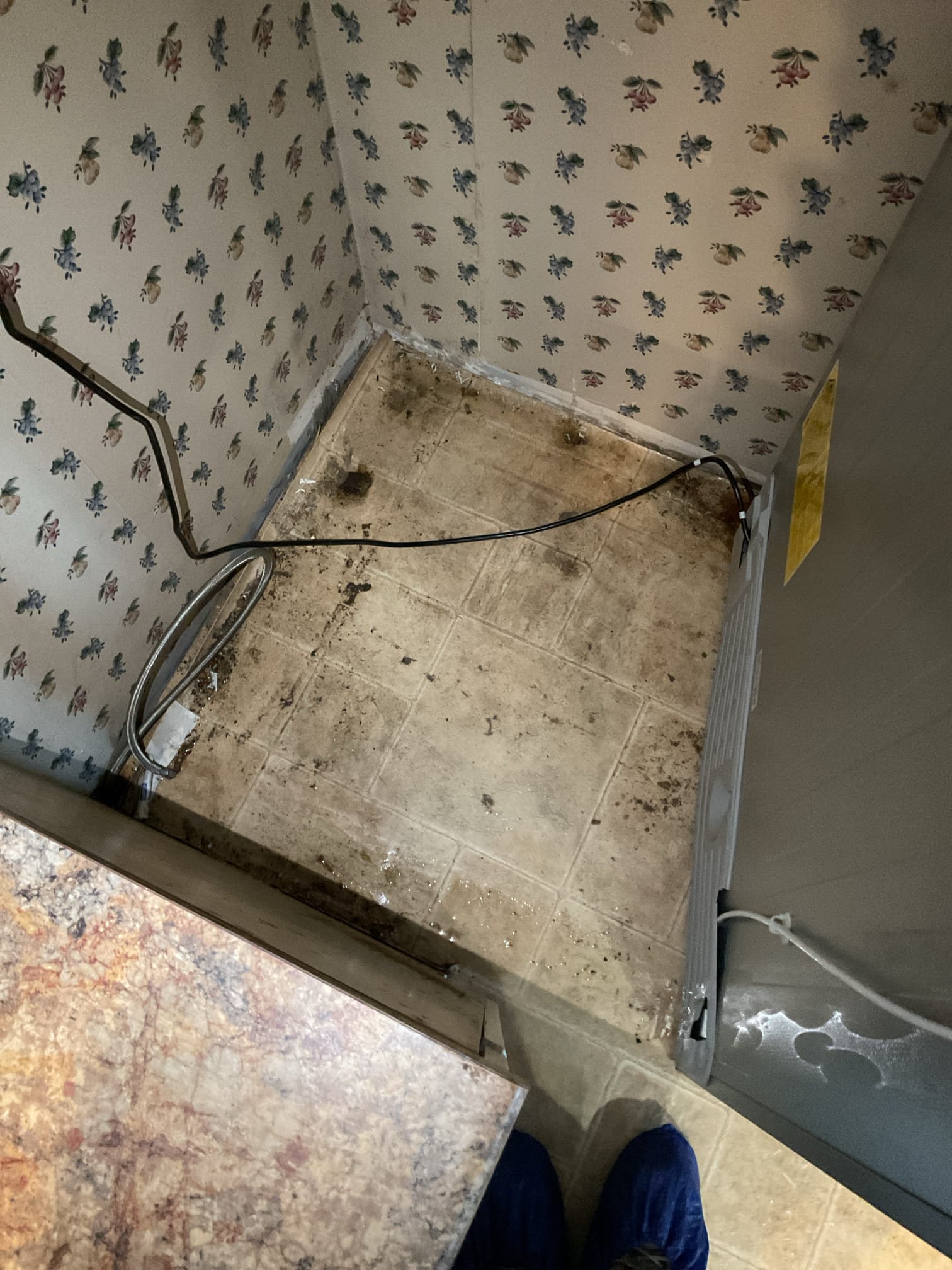 We responded to a report of a refrigerator leaking water that had been installed earlier today by Best Buy. Upon inspection, we found that the refrigerator had not been properly connected to the water supply line. The water line had been left disconnected at the back of the refrigerator and was lying on the floor, allowing water to continuously run onto the floor. We properly secured and tightened the supply line connection to the back of the refrigerator, then restored water service and tested the connection. After verifying proper installation, we confirmed there were no active leaks and that the refrigerator water supply was functioning correctly.