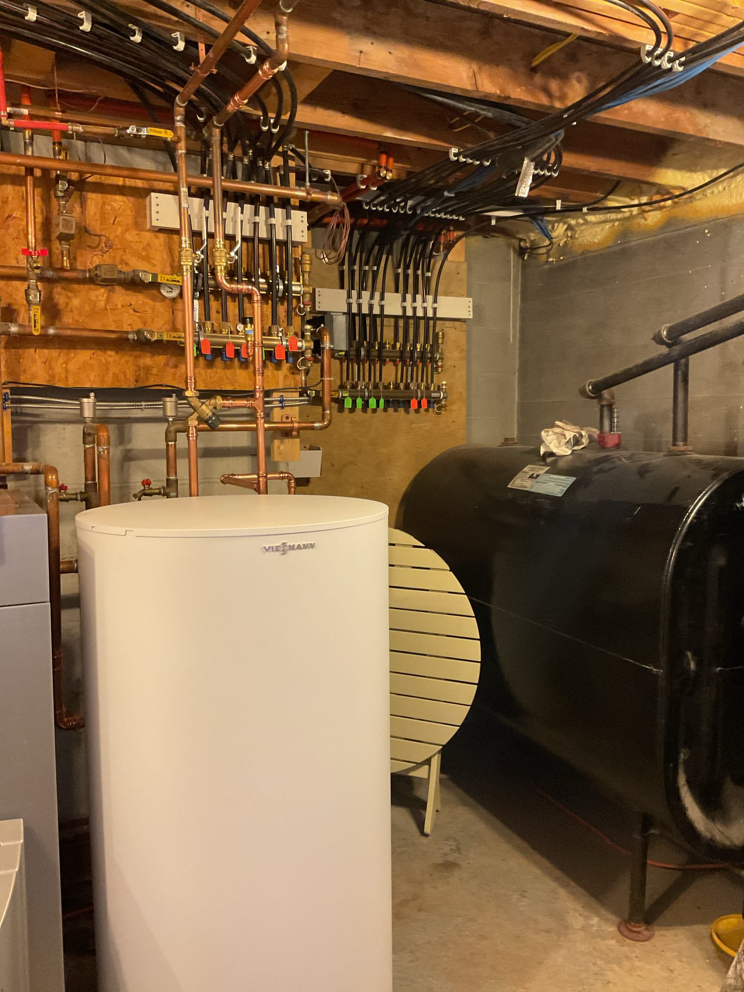 
Upon inspection, the existing water heater was due for replacement and the boiler’s automatic water feeder was found to be malfunctioning. We removed the old water heater and professionally installed the homeowner-supplied unit, added a new thermal expansion tank to protect the plumbing system from excess pressure, and replaced the defective boiler water feeder to ensure proper and automatic system water replenishment. All water connections were completed in accordance with current plumbing and mechanical code standards, the system was filled and tested for proper operation, and all components were verified for safe, leak-free performance. The system is now operating reliably, providing safe hot water and improved protection for the home’s plumbing and heating systems.