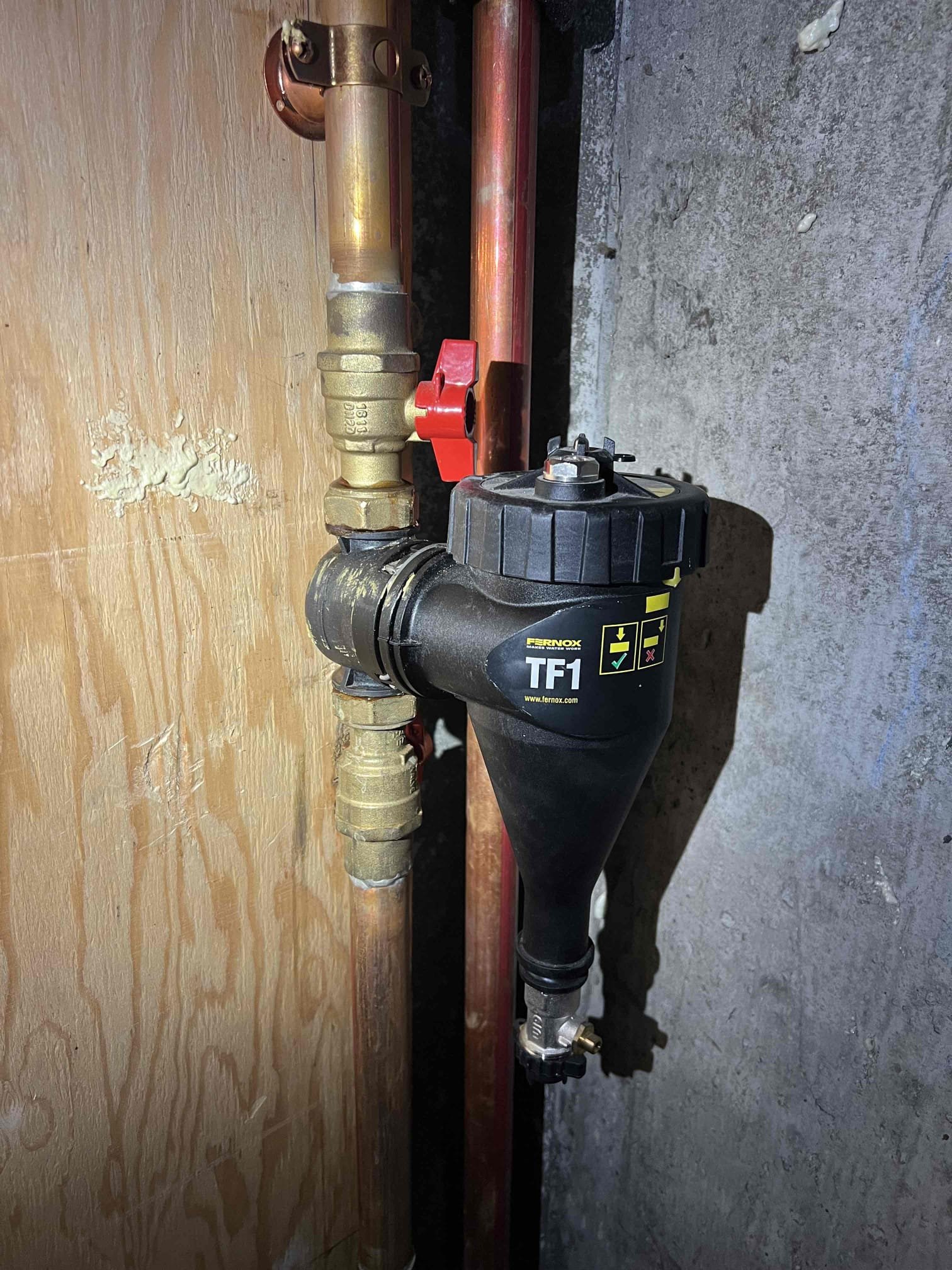 Arrived onsite to investigate water leaking from an IBC boiler. The customer pointed out that the leak was coming from a Fernox magnetic filter. We contacted the supply house and confirmed that the seal kit will be covered under warranty. I provided an estimate for labor only and they accepted. The parts are expected to arrive next week, and we will call to schedule the repair once they are in.