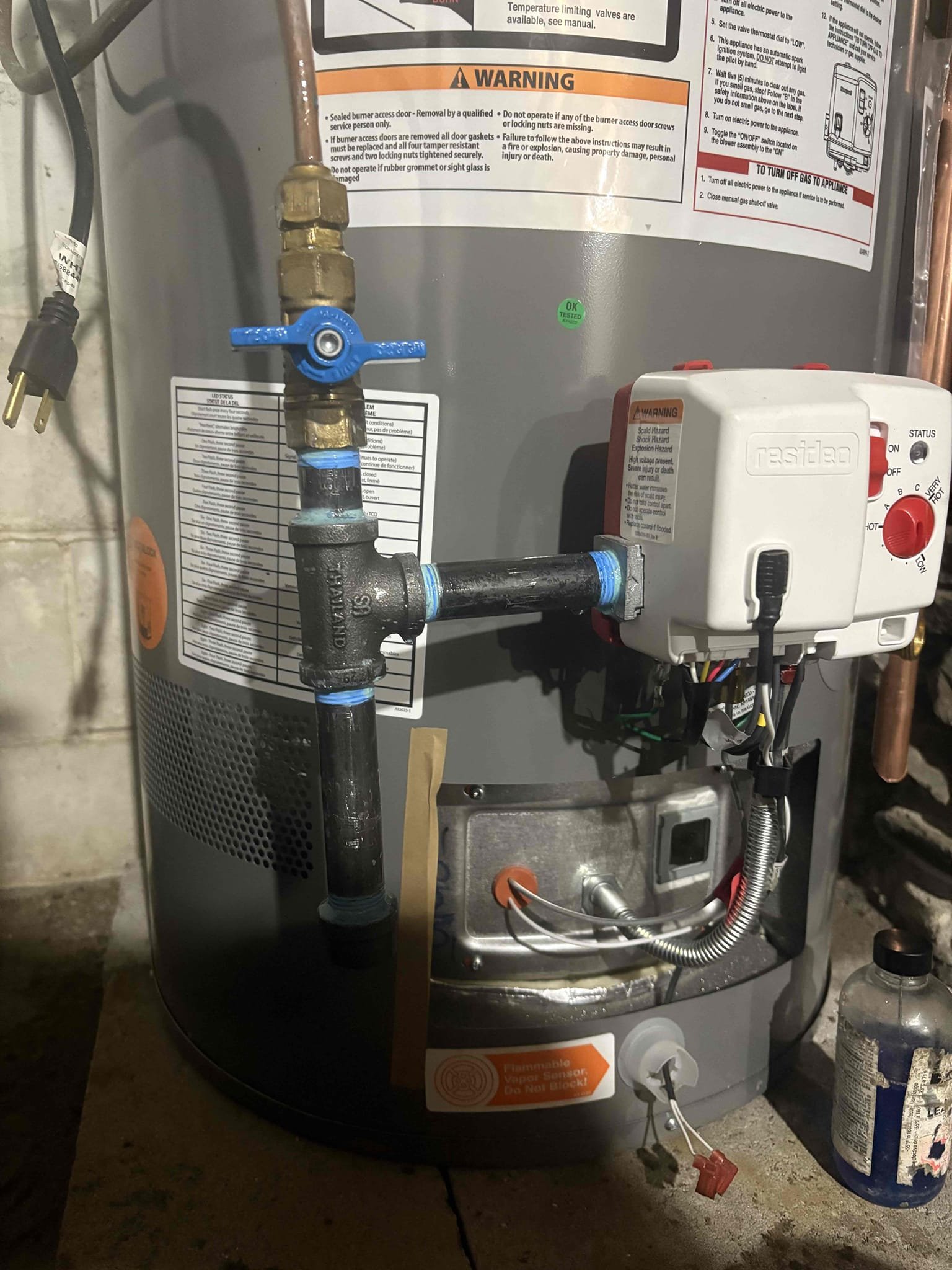 Removed the existing propane water heater and installed a new 40-gallon Rheem power-vented water heater. The old tank was disconnected and removed, and new hot and cold water piping connections were installed. A thermostatic mixing valve was added and set to 120°F, and the water heater temperature was set to 140°F.

All gas piping connections were leak tested and bubble tested, and no leaks are present at this time. An electrical outlet will need to be installed to supply power to the power vent unit. The tank has not yet been filled, and the gas supply to the unit remains shut off until power is provided and final startup can be completed.