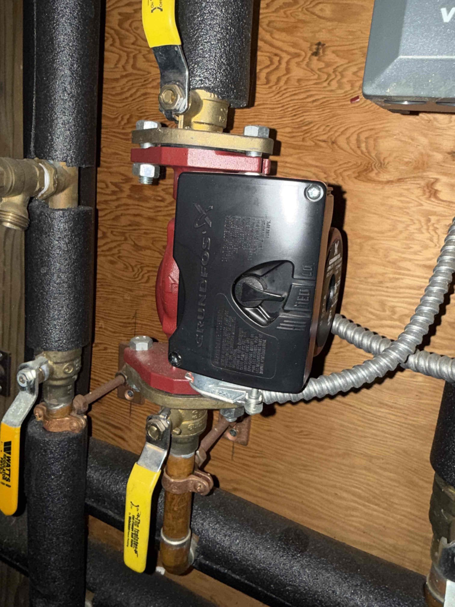 Performed a site visit to evaluate the boiler system configuration. Isolated the wood boiler by closing the appropriate valving to prevent it from drawing water from the oil boiler. Labeled the valve for clear identification in the event the customer chooses to place the wood boiler back into operation.