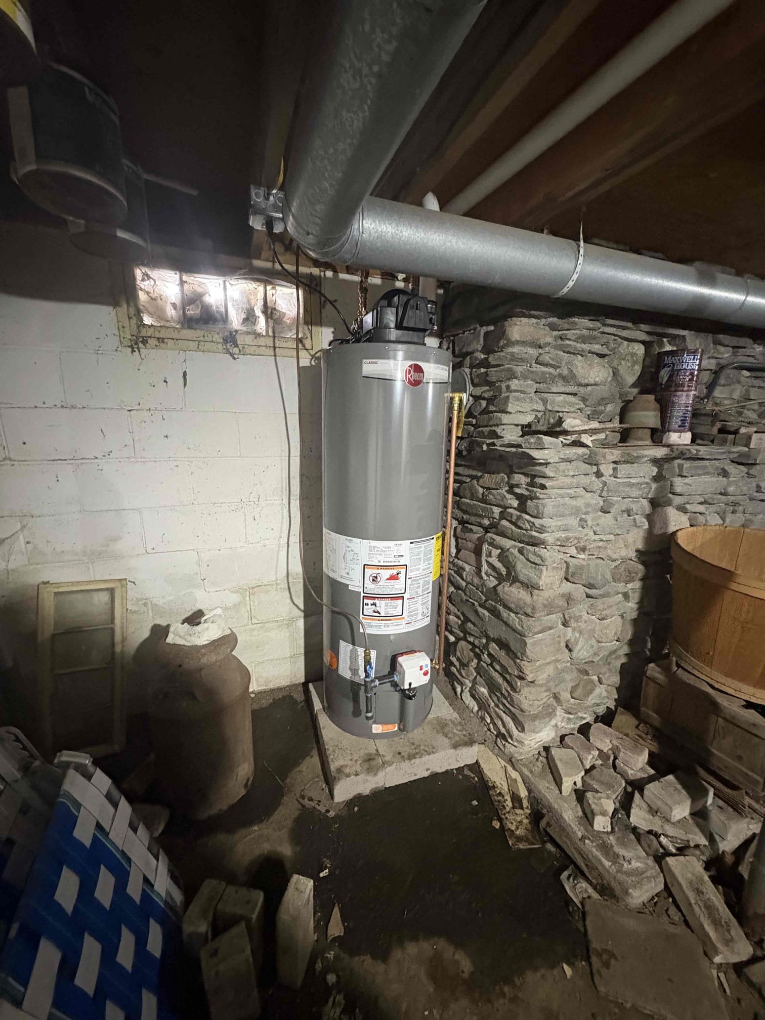 Completed installation of a Rheem 40-gallon power-vented propane water heater.

Installed a new electrical outlet above the unit to supply power to the power venter. The water heater was filled and purged of air, and proper operation was verified.

The mixing valve was set to 120°F, and the tank temperature was set to 140°F.

The unit is operating properly at this time.
