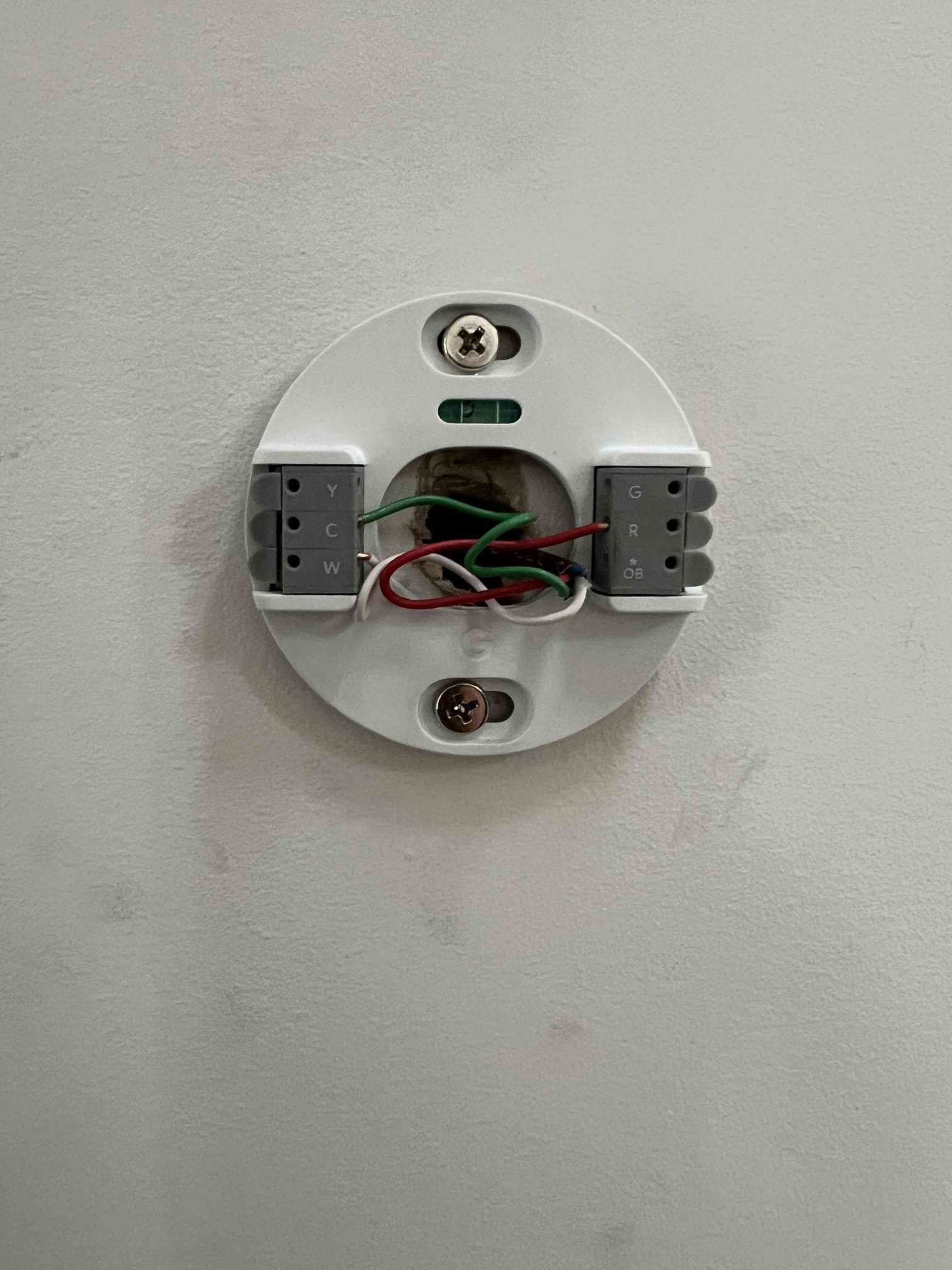 Arrived onsite to evaluate a new installation. Upon arrival, I observed multiple issues that needed to be addressed. I discussed these findings with the customers, and they approved the work to pipe the relief valve to the floor and to diagnose the blinking Taco zone valve control.

I tested all thermostats and verified they are operating properly. The blinking light is the result of a communication error caused by the current system wiring. The customers also requested that the chimney opening from the old boiler vent be capped.

Additional deficiencies noted include the need for a mixing valve, a backflow preventer, rotation of the main circulator, and installation of a 4-inch sediment trap on the gas line. I will prepare an estimate for the above work.

At this time, the system is providing heat and domestic hot water, but it is not heating the house effectively. Installing a mixing valve for the radiant zone will allow the high-temperature zone to be increased to 180°F, which will 