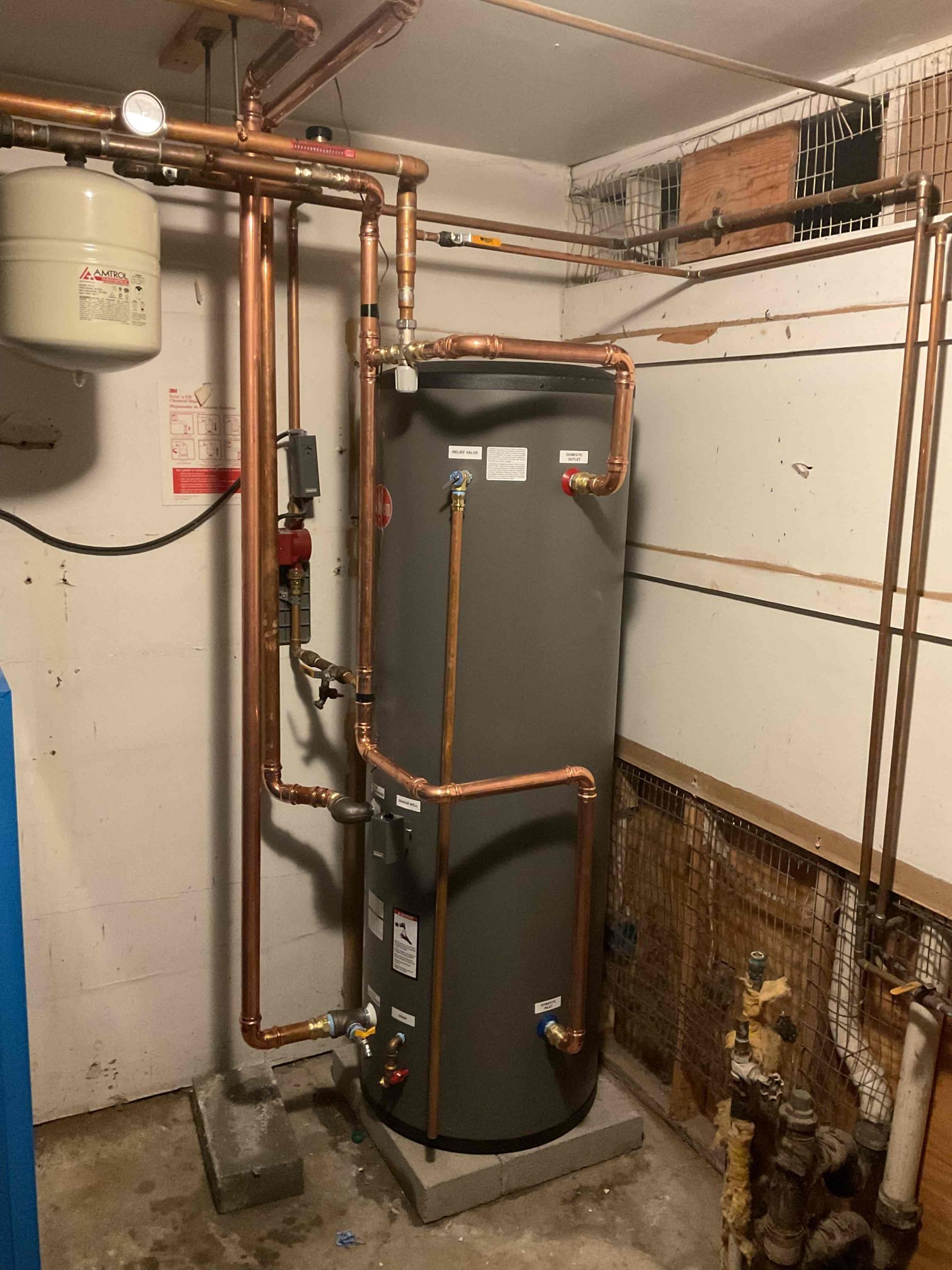We installed new 80 gallon Rheem indirect water heater. Installed new Aquastat, mixing valve, and near water heater piping. Set tank temp to 140 degrees, set mixing valve to deliver 120 degree water to fixtures. Confirmed proper operation of system. 