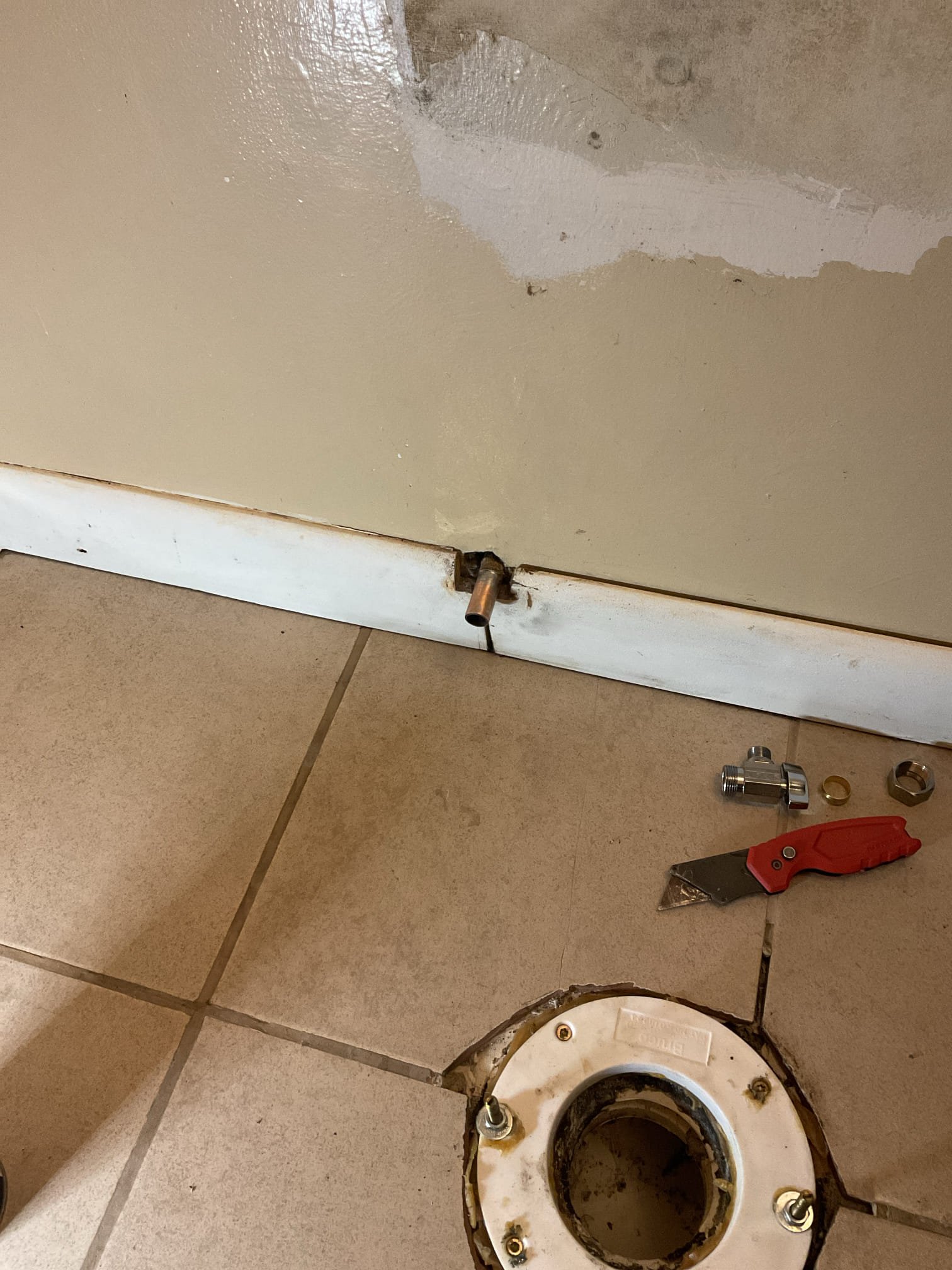 The existing primary bathroom toilet is outdated and showing signs of wear that affect performance and reliability. We proposed replacing it with a new Kohler Highline Comfort Height elongated toilet to improve comfort, efficiency, and dependable operation. We shut off the water supply to the toilet, drained the tank and bowl, unbolted the toilet, and removed and disposed of the unit. After removal, we thoroughly cleaned all surfaces and inspected the toilet flange, which was found to be in good condition. We replaced the flange screws and installed a spacer to raise the flange to floor level.

The existing emergency shutoff valve was proactively replaced due to its age and potential risk of failure. We recommended installing a new shutoff valve to improve reliability and ensure the water supply can be safely and quickly shut off if needed. While the toilet was removed, the house water was shut off and the system was fully drained. We unsoldered the existing valve, cleaned the pipe tho