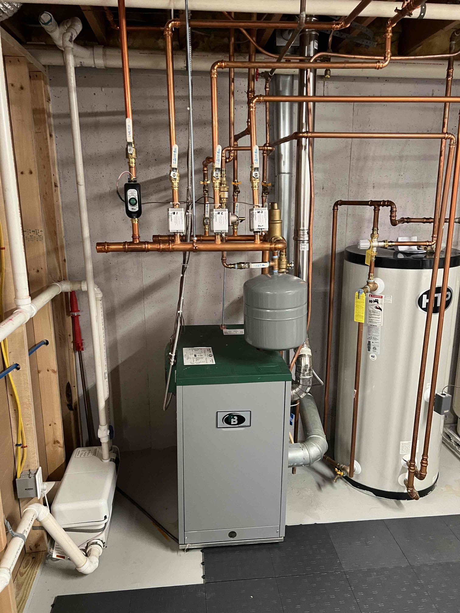 Performed annual tune-up on a Peerless propane boiler.
Cleaned the burners, heat exchanger, igniter, flame sensor, and pilot assembly. Inspected safety controls, relief valve, expansion tank, venting, and overall hydronic system function. Bubble-tested the pilot line and checked carbon monoxide levels—no leaks detected. Flushed sediment from the indirect water heater. Verified proper operation; the system is functioning correctly at this time. Emailed estimates to drain the Modine in the garage and add antifreeze to the boiler system.
