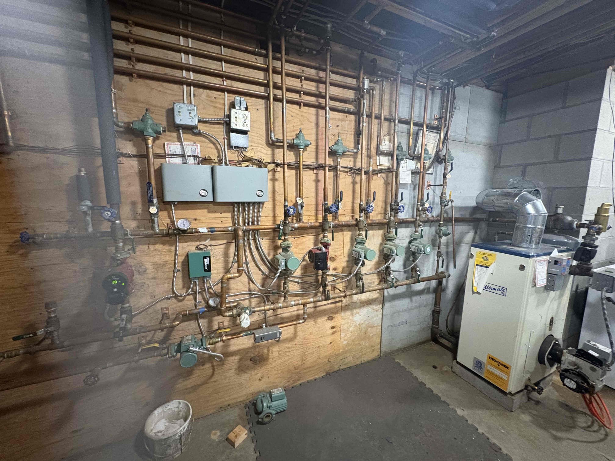 Arrived on site to perform the annual tune-up on the existing Ultimate oil boiler. During the visit, we discussed the current condition of the boiler and its overall life expectancy. Given the age of the unit and considerations for long-term reliability and peace of mind, John has decided that replacement would be the best option.

We reviewed several replacement possibilities. Based on John’s past experience and preferences, he would like to receive estimates for both Buderus and Viessmann oil boiler options.

I will be preparing and providing John with detailed estimates for a full boiler replacement, including options for both manufacturers.