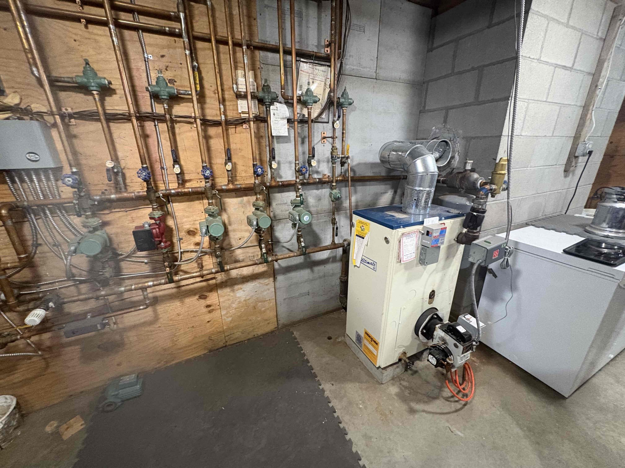 Arrived on site to perform the annual tune-up on the existing Ultimate oil boiler. During the visit, we discussed the current condition of the boiler and its overall life expectancy. Given the age of the unit and considerations for long-term reliability and peace of mind, John has decided that replacement would be the best option.

We reviewed several replacement possibilities. Based on John’s past experience and preferences, he would like to receive estimates for both Buderus and Viessmann oil boiler options.

I will be preparing and providing John with detailed estimates for a full boiler replacement, including options for both manufacturers.