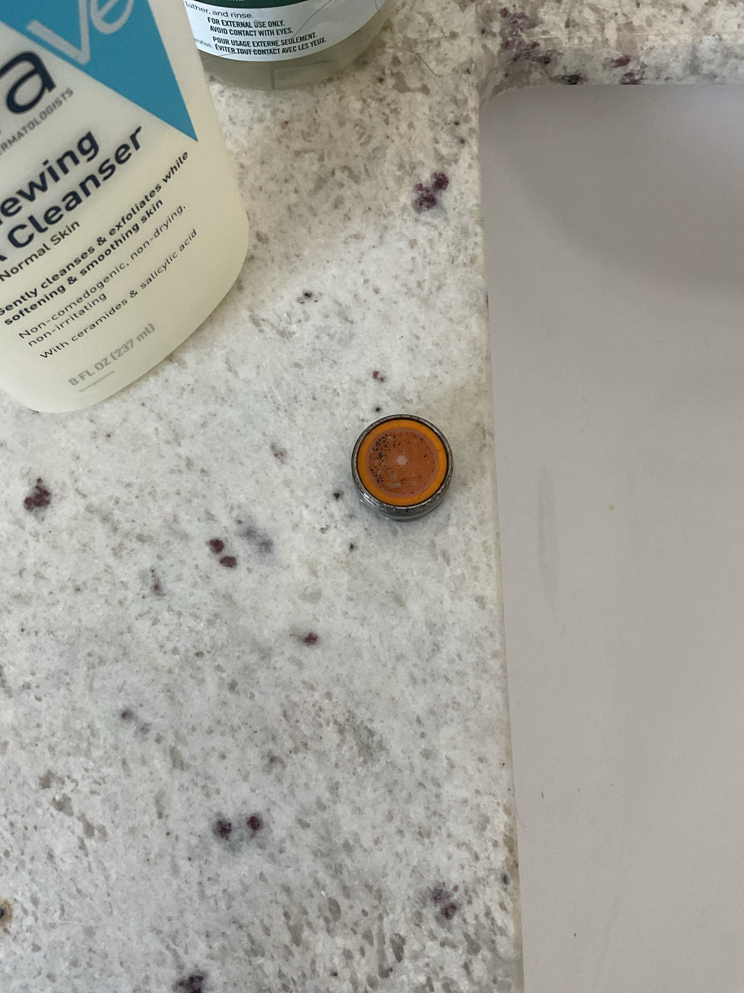Multiple fixtures had low water pressure due to sediment clogging the aerators. We removed and cleaned the aerators to restore proper flow and reliable fixture performance. Upon arrival, we investigated the cause of the low pressure and found that the sediment filter was not clogged and the pressure tank was not waterlogged. At the kitchen faucet, we found low pressure, but removing the sprayer head restored full flow, confirming the restriction was in the aerator. We also verified that not all fixtures were affected, as the half-bath faucet had good pressure. With approval, we inspected all aerators and cleared sediment from each unit. All sinks and lavatories had been heavily restricted but are now operating properly with normal flow and no leaks.

While attempting to clean the aerators for the laundry valve due to a low-flow error code, a leak developed from the valve body due to the unit’s deteriorated condition. The laundry shutoff valve and hoses were heavily corroded and at risk