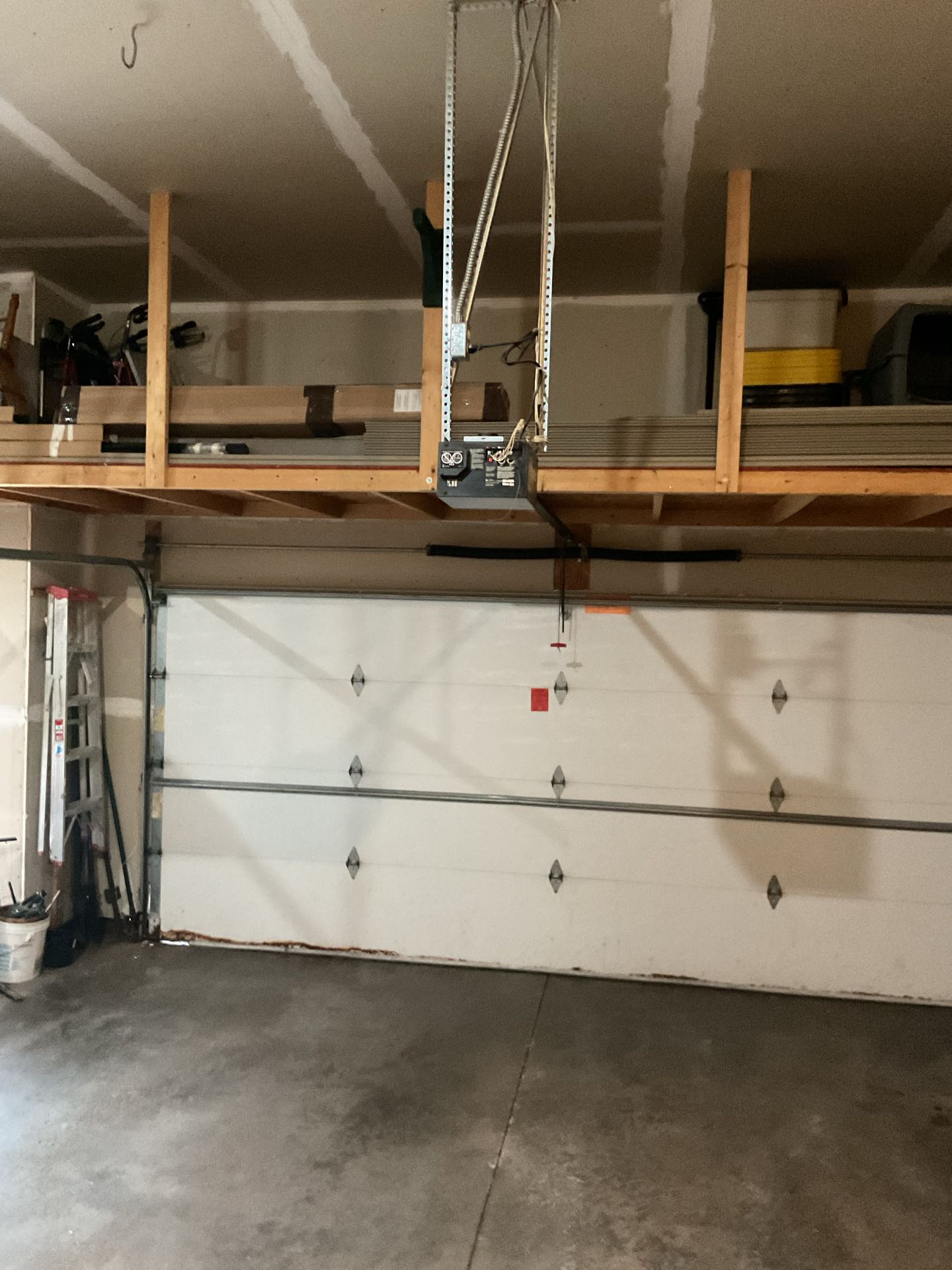 Recently, I completed a comprehensive garage door service that included both repair and tune-up tasks. First, I inspected the entire garage door system, identifying any worn or damaged components. I replaced a malfunctioning opener motor, ensuring smooth and reliable operation. Next, I addressed a squeaky track issue by lubricating the rollers and tracks, enhancing the door's quietness and efficiency. Additionally, I tightened all hardware connections and adjusted the door's alignment to ensure it opened and closed seamlessly. I also checked the safety sensors and realigned them if necessary, prioritizing safety. Finally, I conducted a thorough test of the door's functionality, making any final adjustments to guarantee optimal performance. This 