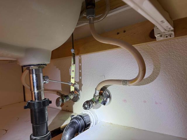 The technician installed 15 emergency shut off valves with supply lines, (10 for bathroom faucets , 3 for toilets, and 2 for the kitchen)  a customer supplied bathroom faucet with pop up assembly, a customer supplied Moen posi-temp cartridge with tub/shower trim which included the trim plate and handle, the handheld shower head, tub spout, and the overflow plate. The technician also replaced the flapper and fill valve in the master bathroom toilet. The old emergency shut off valve for the toilet in the master bathroom had been installed too tightly which caused leaking so the technician had to cut off the end of the stubout and solder a coupling with a new stubout to properly and securely install the emergency shut off valve for that toilet.  The technician installed 15 emergency shut off valves with supply lines, (10 for bathroom faucets , 3 for toilets, and 2 for the kitchen)  a customer supplied bathroom faucet with pop up assembly, a customer supplied Moen posi-temp cartridge with tub/shower trim which included the trim plate and handle, the handheld shower head, tub spout, and the overflow plate. The technician also replaced the flapper and fill valve in the master bathroom toilet. The old emergency shut off valve for the toilet in the master bathroom had been installed too tightly which caused leaking so the technician had to cut off the end of the stubout and solder a coupling with a new stubout to properly and securely install the emergency shut off valve for that toilet.