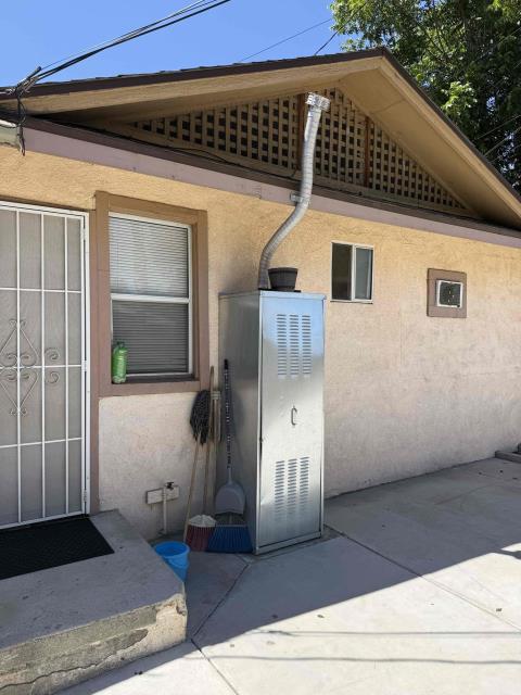 Upon arrival, the technician removed the existing water heater venting and the exterior water heater shed enclosure to gain proper access for the repair. The technician installed a new code-compliant water heater vent, ensuring the vent was properly secured with approved support straps while maintaining the required clearance away from the roof structure. A new vent cap was also installed at the termination to provide proper weather protection and safe venting of combustion gases. After installation, the technician verified that the venting system was properly aligned, securely supported, and operating as intended. The exterior water heater shed was reinstalled upon completion of the work, and the system was left in proper working order.