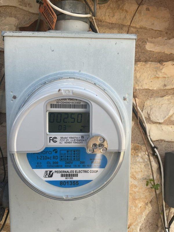 Conducted comprehensive electrical maintenance service on a 48-year-old residence with two breaker boxes located in the garage and laundry room. Performed thorough inspection of electrical panels, including main distribution panel mounted on stone wall and digital Pedernales Electric Coop meter. Completed system tune-up with verification of circuit labeling and operational status of all breakers.