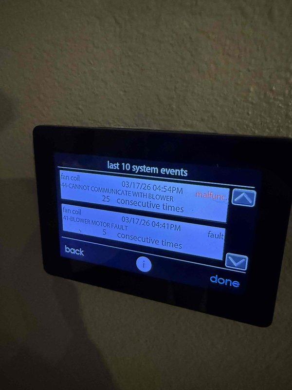 Performed diagnostic inspection on 2-year-old HVAC system located in attic. System control panel displayed multiple error codes including "cannot communicate with blower" and "blower motor fault" occurring consecutively. Observed clean filters with proper installation but confirmed system communication failure between thermostat and blower motor components. Identified thermostat communication issue as primary cause of system failure.