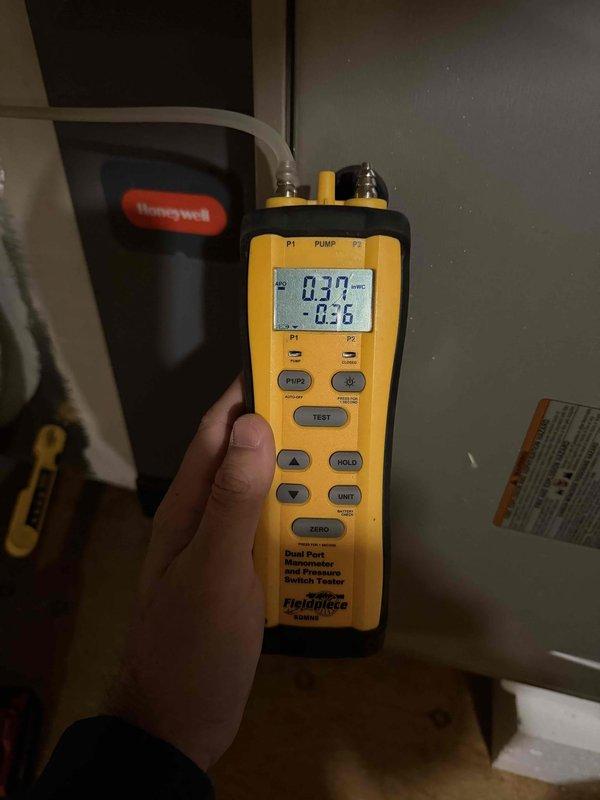 Completed spring maintenance on an 8-year-old single HVAC system located in attic space. Performed comprehensive inspection of condenser unit, evaporator coil, and air handler components. Utilized Fieldpiece dual port manometer to measure system pressures and verify proper refrigerant charge levels. Documented all findings on standardized maintenance checklist covering condenser operation, evaporator performance, air handler functionality, and ductwork condition. System operating within normal parameters with no deficiencies noted requiring immediate attention.