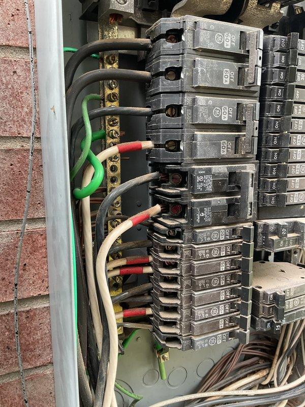 Completed comprehensive electrical maintenance service on 1996 home with two breaker panels located in garage and exterior. Performed whole home electrical inspection and tune-up on both panels, verifying proper operation of all circuit breakers, checking wire connections at terminal points, inspecting main disconnect components, and confirming grounding conductors are secure. All electrical components found operating within normal parameters with no immediate safety concerns identified.