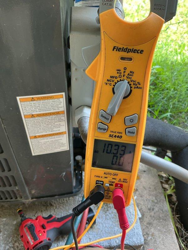 Completed spring maintenance on 5-year-old heat pump system located in attic. Performed standard seasonal inspection including visual examination of electrical components, wiring connections, and control board. Measured and documented electrical readings using digital multimeter at outdoor unit, recording voltage of 103.3V. Inspected interior electrical compartment, noting multiple wire connections, contactors, relays, and transformer. System currently operational with no immediate safety concerns identified during maintenance visit. Customer previously declined recommended service appointment for ongoing thermostat issues and heat pump diagnostic concerns noted during fall maintenance, including system running on emergency heat strips and suspected low refrigerant levels. Thermostat O terminal voltage fault remains unaddressed from prior visit. All standard maintenance procedures completed per membership agreement protocols.