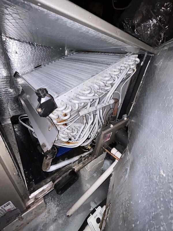 Completed warranty follow-up duct cleaning on single-zone HVAC system located in attic. Thoroughly cleaned flexible ductwork throughout system, removing accumulated dust, debris, and contamination from interior surfaces of supply and return ducts. Verified evaporator coil condition and proper airflow, ensuring all ductwork connections remain properly sealed following previous mastic application. System operating efficiently with no hot or cold spots reported.