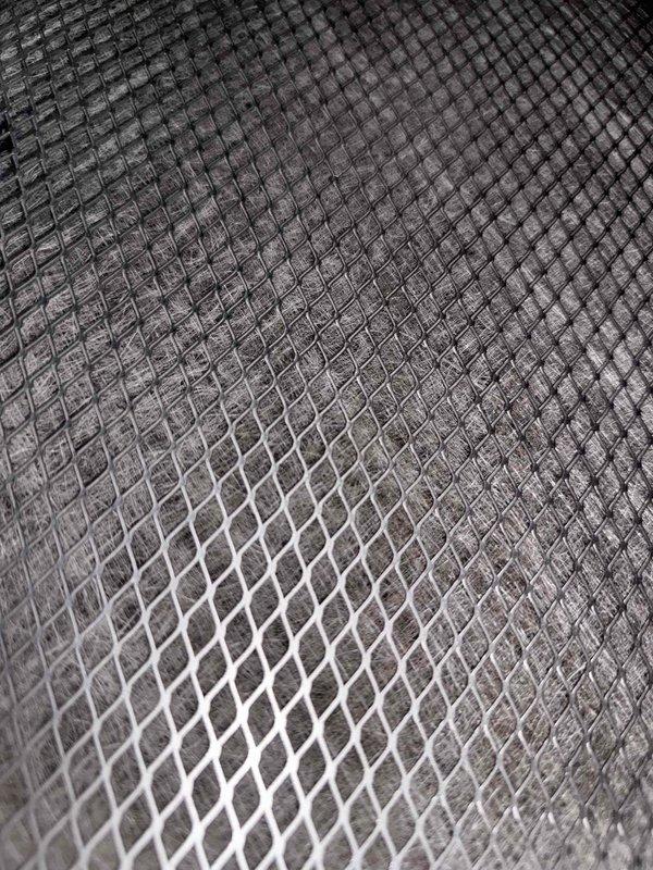 Responded to thermostat warning message on one-year-old HVAC system located in attic. Performed diagnostic inspection of system components and ductwork. Inspected air filter element, which showed signs of dust accumulation in the pleated media with visible particulate buildup between filter elements. Examined flexible ductwork installation throughout attic space, noting secure connections with strapping and general condition of reflective insulation wrapping. Verified system accessibility and conducted thorough visual assessment of installation. All findings documented with photographic evidence for customer records.