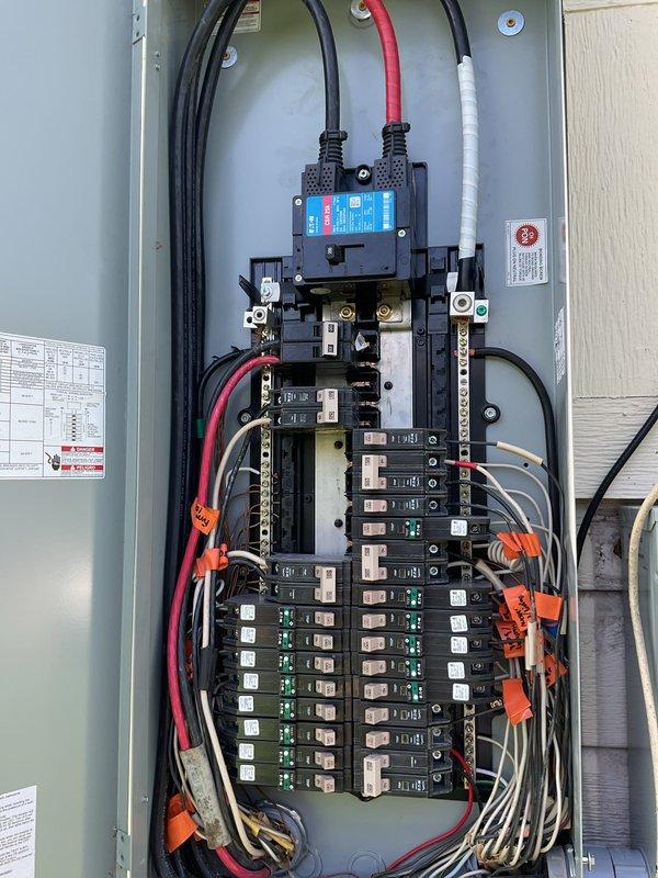 Completed comprehensive electrical maintenance inspection on 1995 residential property with recently installed main electrical panel. Performed thorough evaluation of all circuit breakers, bus bar connections, and panel integrity. Inspected main disconnect, verified proper torque on all terminal connections, and tested breaker functionality throughout the dual-column breaker arrangement. Evaluated neutral bar connections and grounding system integrity. Assessed exterior-mounted panel enclosure for proper weatherproofing and conduit sealing. Reviewed circuit labeling and updated panel directory for accuracy. Discussed generator connection requirements with homeowner and provided recommendations for future interlock installation and dedicated generator receptacle circuit to enable backup power capability during outages. All breakers operating within normal parameters, no immediate safety concerns identified. Panel showing excellent condition with proper wire management and secure connect