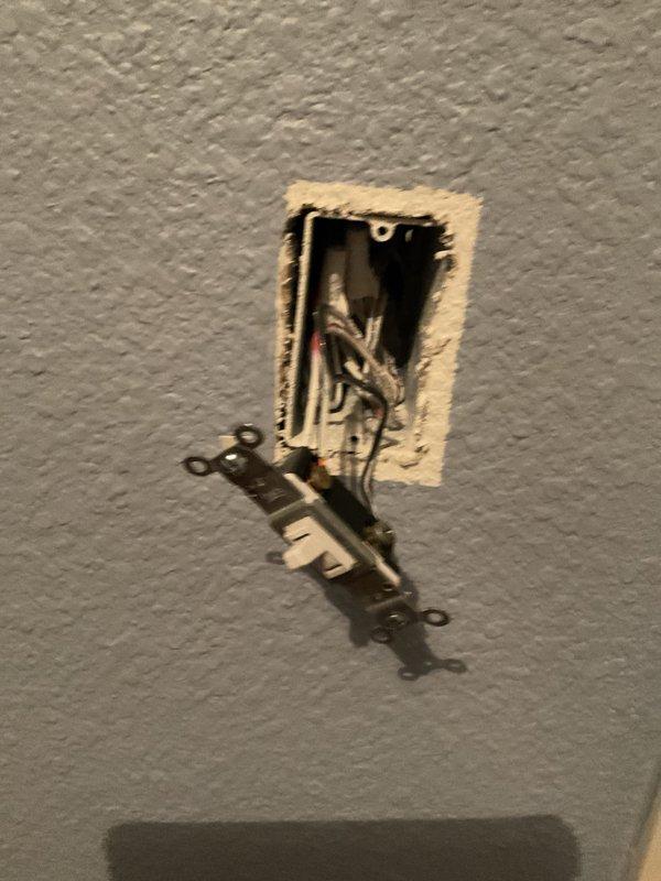 Responded to service call for malfunctioning light switch that would not turn off in 31-year-old residential property. Upon arrival, inspected the affected switch and ceiling-mounted dome light fixture with frosted glass shade. Removed wall plate and extracted switch from electrical box to diagnose the issue. Found faulty toggle switch mechanism with internal contact failure preventing proper off position engagement. Disconnected existing switch, verified wire connections and junction box integrity, and installed new residential-grade light switch. Secured switch to mounting bracket with appropriate hardware, confirmed proper wire termination with twist connectors, and reinstalled wall plate. Tested switch operation through multiple on/off cycles to verify complete functionality and proper circuit control of overhead lighting fixture.