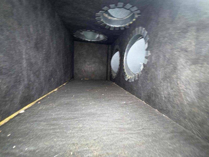 Completed comprehensive spring maintenance on 11-month-old HVAC system in 2,041 square foot residential property. Performed full system inspection and preventative maintenance service, including air handler and ductwork evaluation. System has been operational since installation and had one warranty service call in October related to heating mode temperature control, which was previously resolved. 

Accessed interior air handler unit located in hallway closet and conducted thorough visual inspection of all accessible components. Examined ductwork interior conditions and noted moderate dust and particulate accumulation on metal surfaces and damper mechanisms, consistent with normal operation timeframe. Observed three circular ports and damper assemblies at duct terminus showing standard wear patterns for system age.

Verified all mechanical components are functioning within manufacturer specifications. Checked airflow through supply registers and confirmed proper damper operation. System