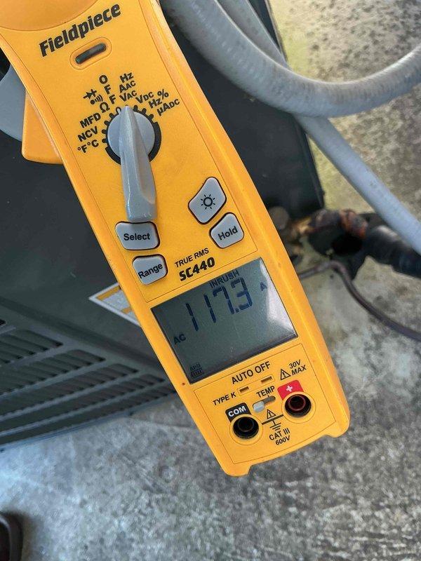 Performed comprehensive non-member maintenance service on two HVAC systems located in attic of 3,990 square foot residential property. Both units are original to the 20-year-old home with an estimated age of 15+ years and no documented prior maintenance history. Attic access was clean, safe, and accessible for thorough inspection and service work.

Conducted complete diagnostic evaluation and tune-up procedures on both systems. Performed electrical testing using digital multimeter, recording voltage readings of 39.35V and amperage draw of 1173 on system components to verify proper electrical operation and identify any performance concerns. Inspected all accessible ductwork, including flexible insulated ducting, for proper connections, air leaks, and general condition. Evaluated system controls, safety switches, and operational sequences on both units.

Completed standard maintenance protocols including filter inspection, condensate drain evaluation, and visual assessment of all major c